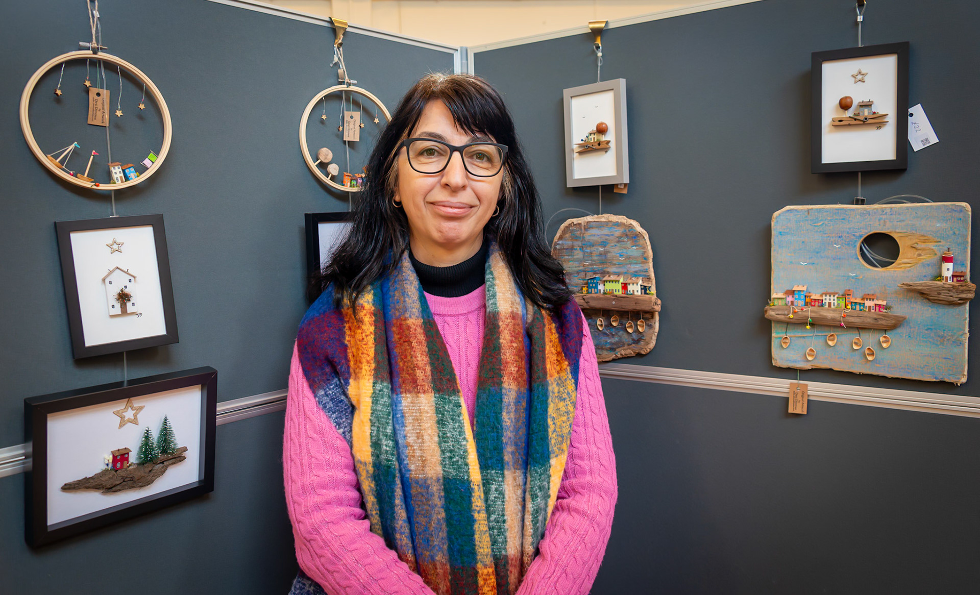 Desi Dimowa, a Bulgarian artist specialising in driftwood and upcycle art at the Arts and Crafts show, St George's Hall, 24th November, 2024. Desi was winner of the Turner Contemporary Portfolio Art Competition 2022. @ddimowa