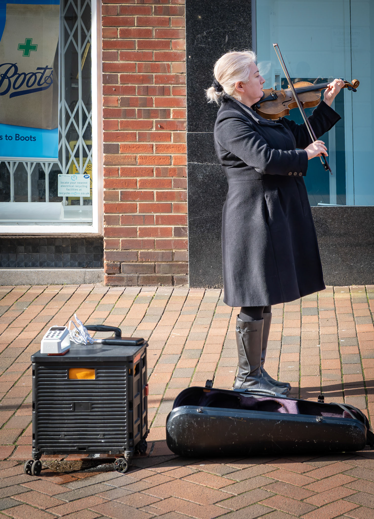 Anonymous fiddler outside Boots. 21st Feb.