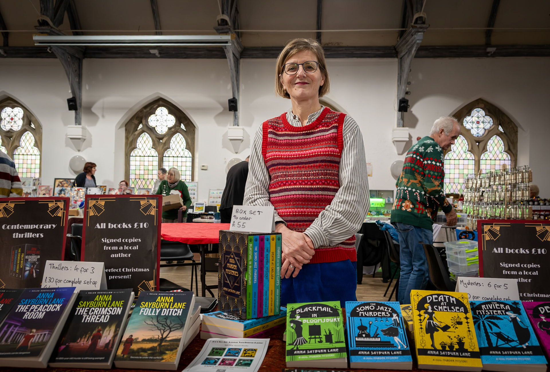 Anna Sayburn Lane, author, displaying and selling her books at the Deal Craft Fair, Landmark Centre, 6th December, 2025.