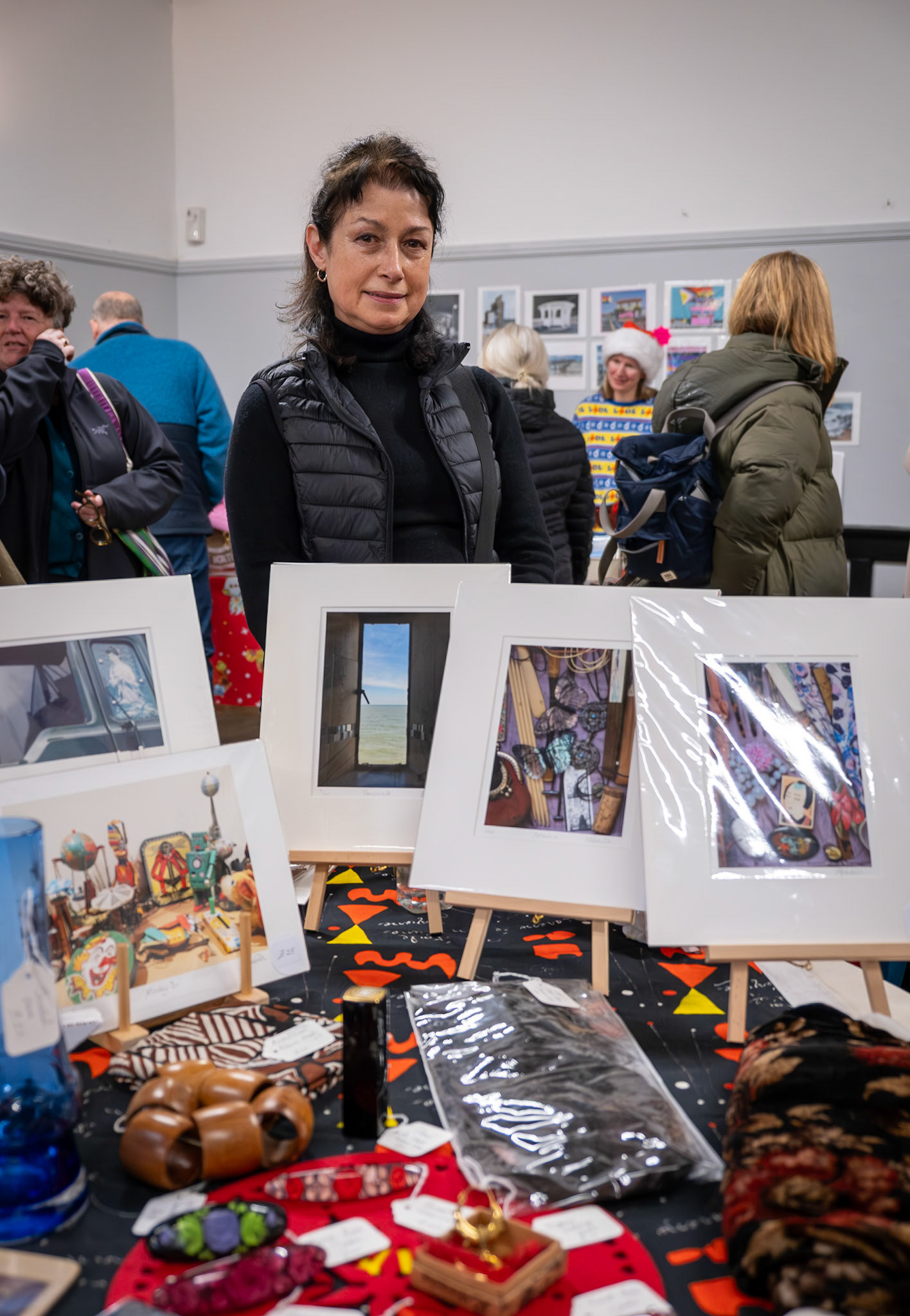 Marian Padina, photographer and artist, at the Deal Flea Market, Landmark Centre, 7th December, 2025. Marian's specialism is in textile art, dying, breakdown, painting and printing for Opera, Ballet, Stage and TV. 