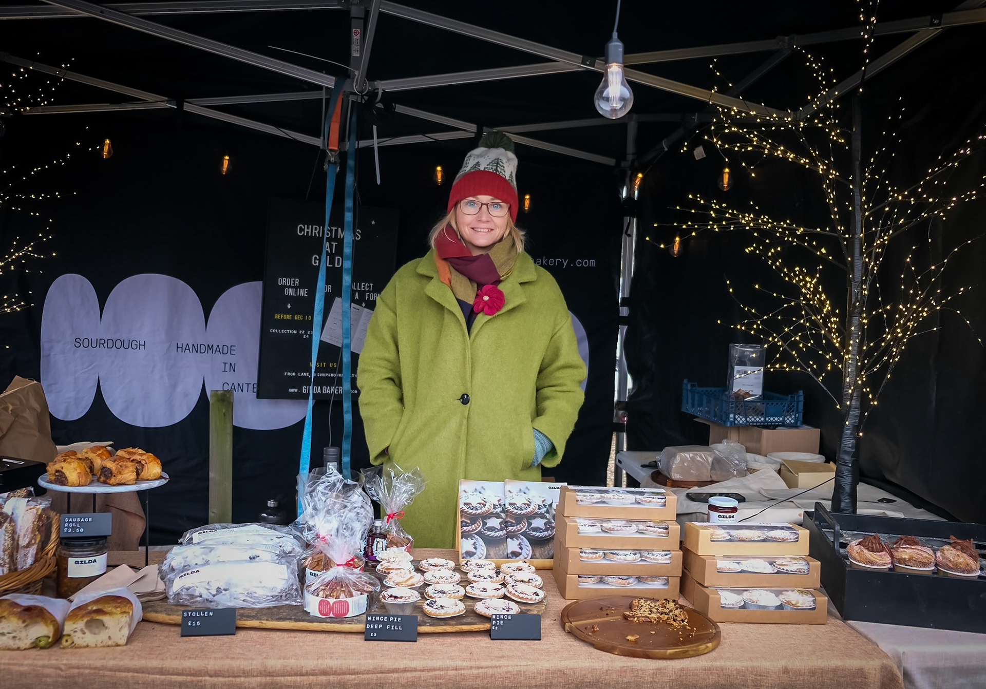 Megan selling cakes, bread and stollen at the Christmas Market, Deal Castle, 2nd December, 2023.