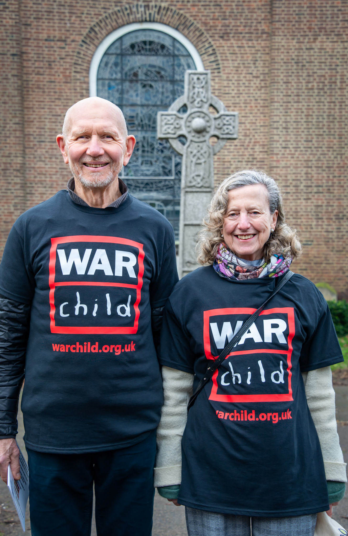 Volunteers advertising the War Child Charity Concert of music hall, cabaret and poems to be hosted by Gavin Esler at St George's Church, High Street, Deal, Saturday 24th February. 9th February, 2024.