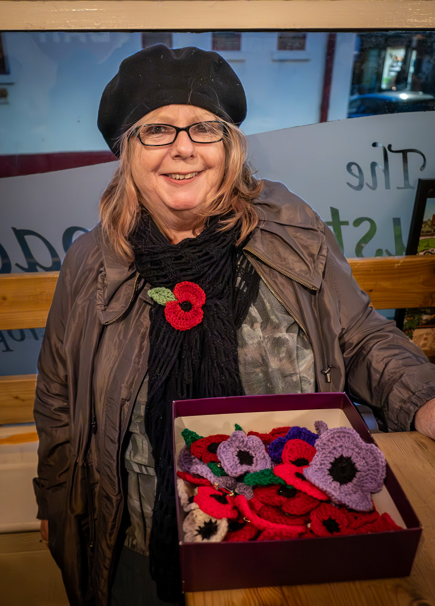 Mary, who crochets and sells poppies for charity for Remembrance Day. The Just Reproach, Saturday, 11th November, 2023.