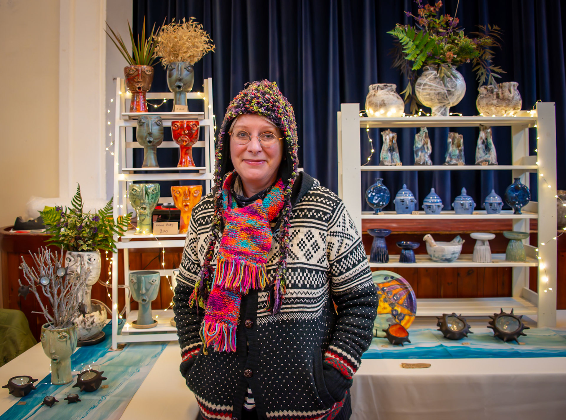 Janis Volckman of Oast House Ceramics, displaying a selection of her handmade pottery at the Arts and Crafts show, St George's Hall, 23rd November, 2024. @Oasthouseceramics