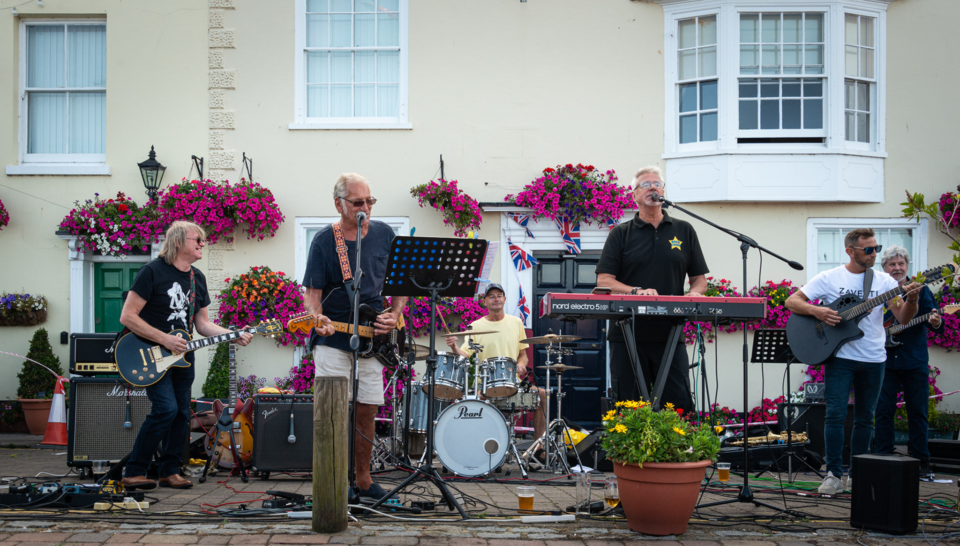 The Tony Johnson Band performing at the Bank Holiday Rock Concert, Kings Head, Port Arms and Dunkerleys, Beach Street Square, 26th August, 2024.