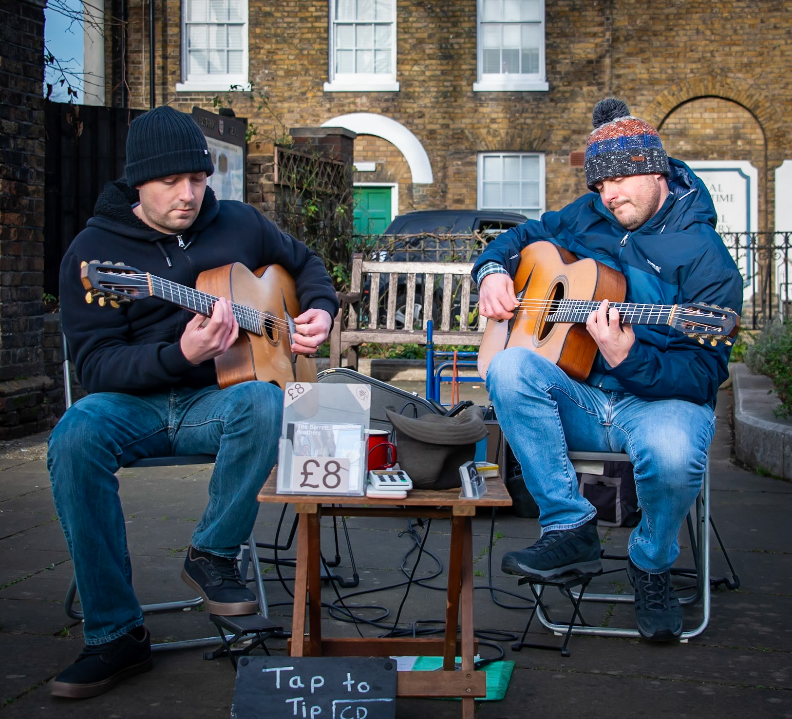 The Barrett Brothers, guitarists, playing this morning in Deal High Street, 23rd December, 2023.