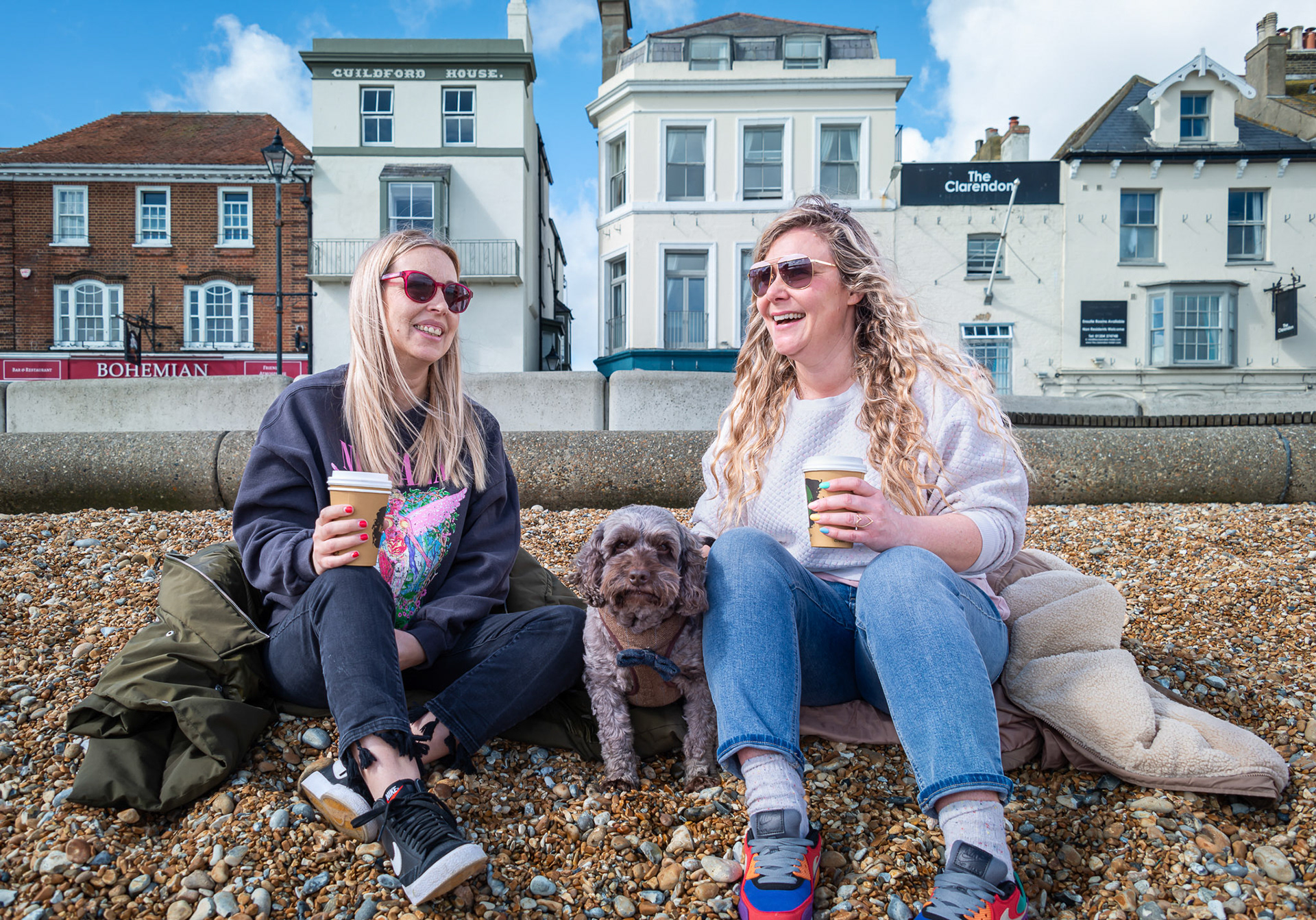 Laura and Jeska having coffee on Deal Beach, alongside the Pier, 1st April, 2024. Laura is a designer of wedding rings and Jeska designs wedding dresses at her shop The Bridal Boutique of Jules, Dover Road, Walmer. https://www.boutiqueofjules.co.uk/