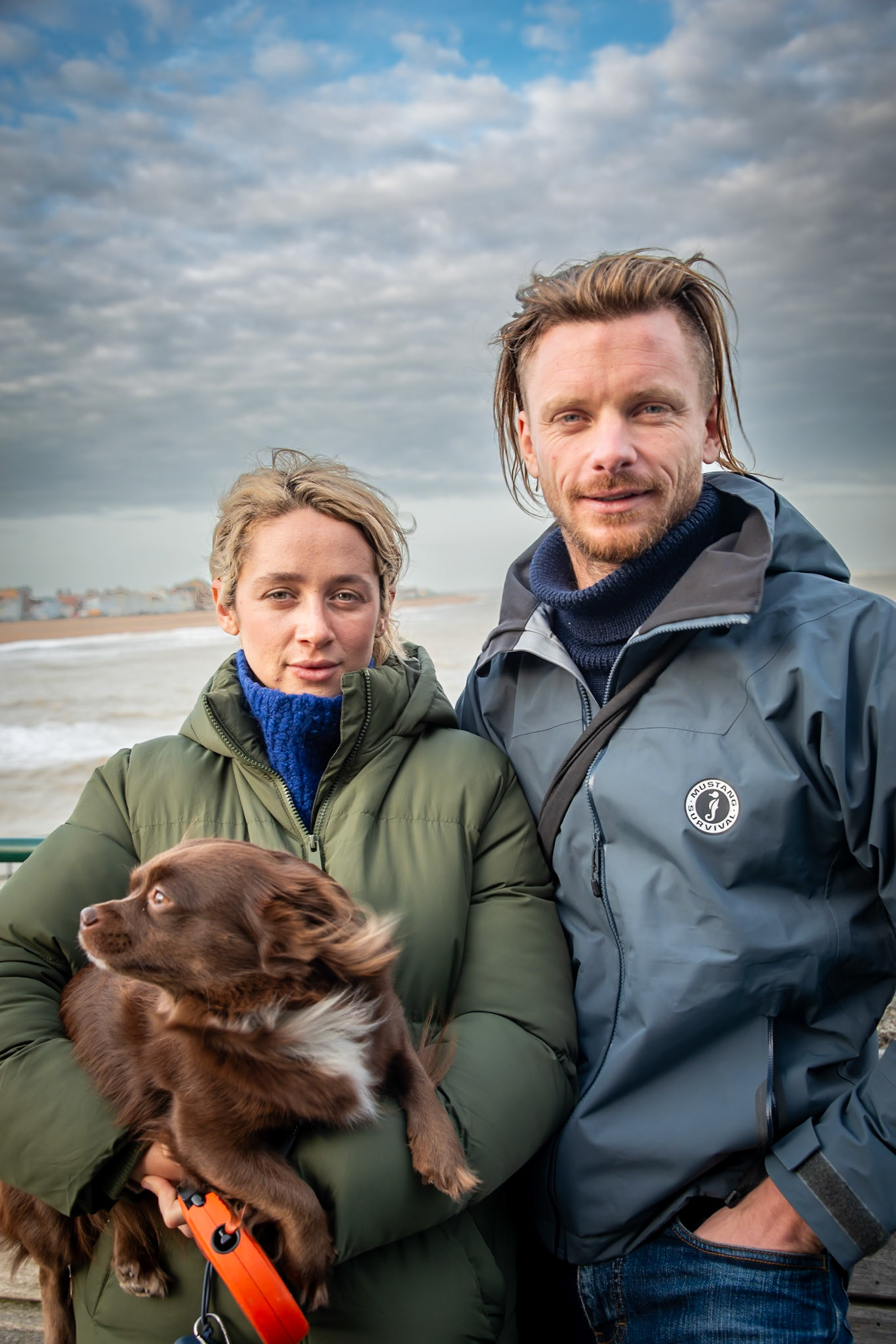 Emma, a graduate in Photography and Will, an author and illustrator, with Bear, a Chiweeni. Deal Pier, 25th November, 2024.  Sharing a table over lunch at The Deal Pier Kitchen, Sue and I discovered that Will designed and created the wonderful mural of tides and phases of the moon in the entrance Hall. William Thomson at www.tidalcompass.com