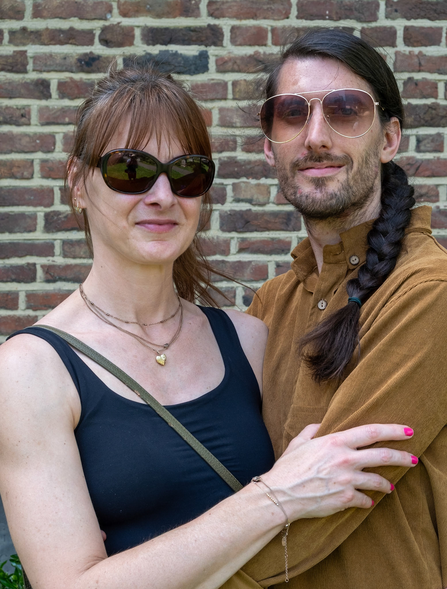 Sarah and Stuart visiting from London. Sarah is a CEO of a non-profit company. Stuart is a musician. St Georges Churchyard, 23rd May, 2026.