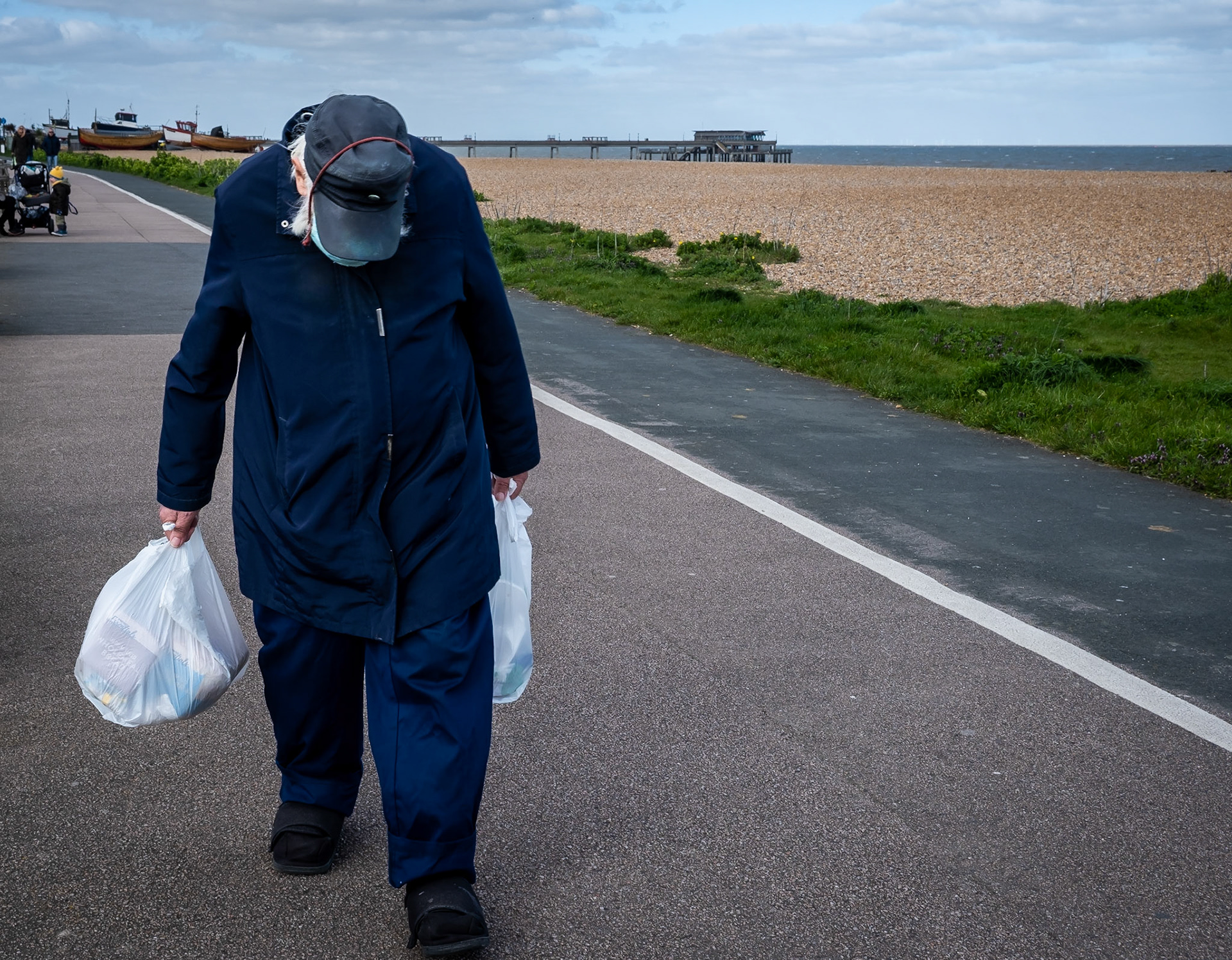 Fred Upton carrying his daily purchase of sliced bread to Walmer Beach to feed the Seagulls.