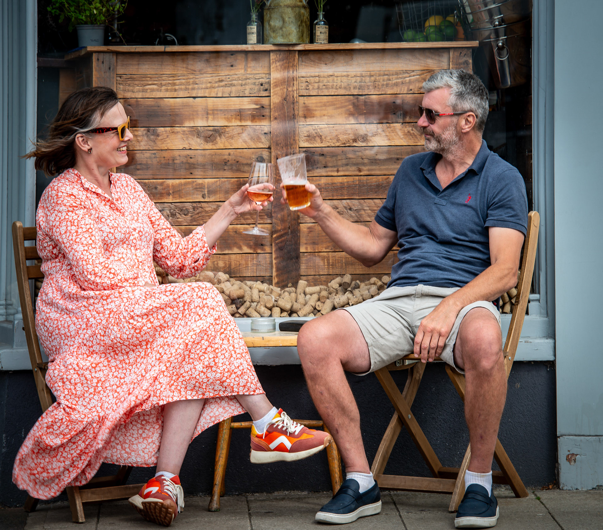 Victoria and Chris outside Bloody Mary's. Victoria is a harpist. Chris is a builder.