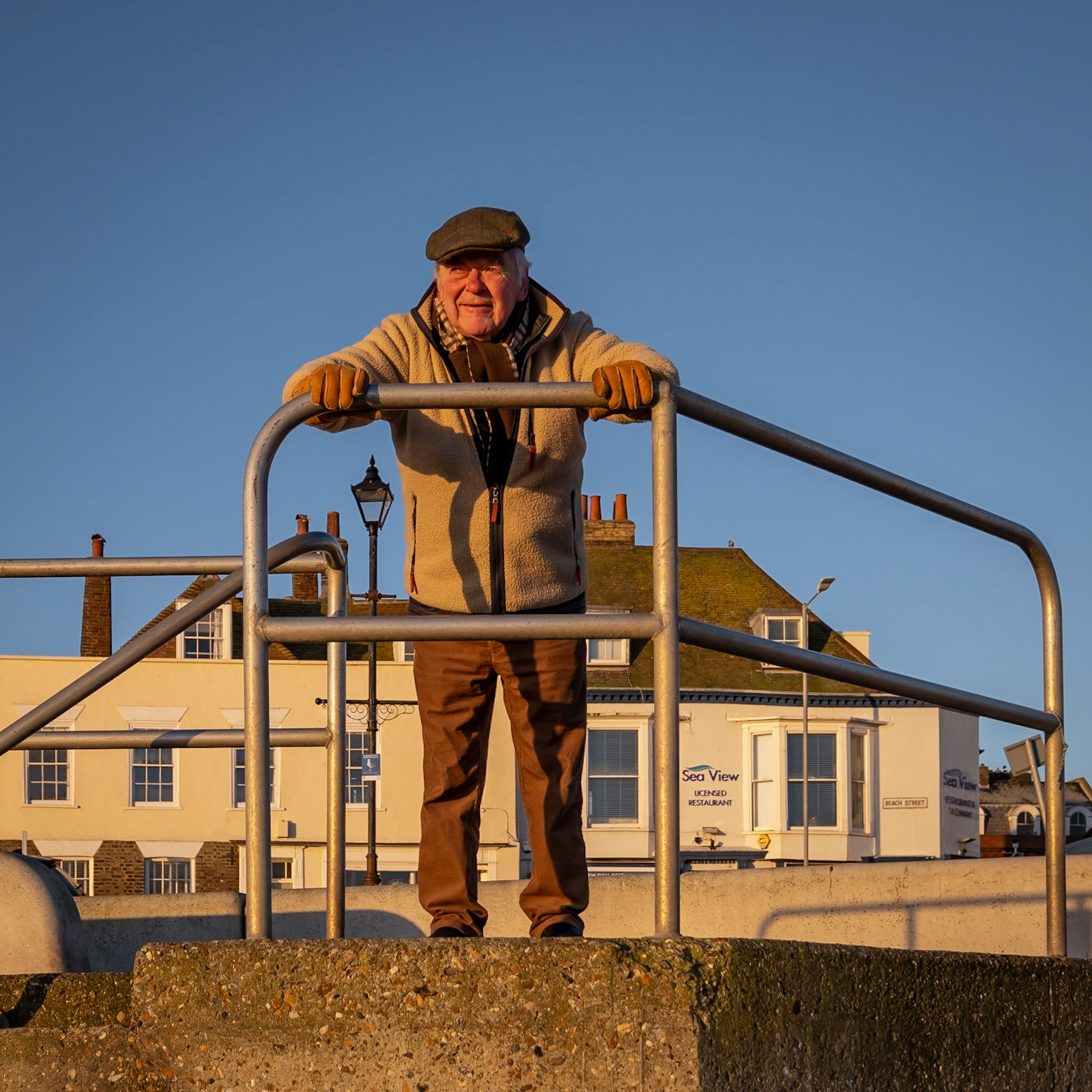 John Burrows, local painter doing his morning press-ups. 20th January.  John does 200 press ups on this bar each morning.