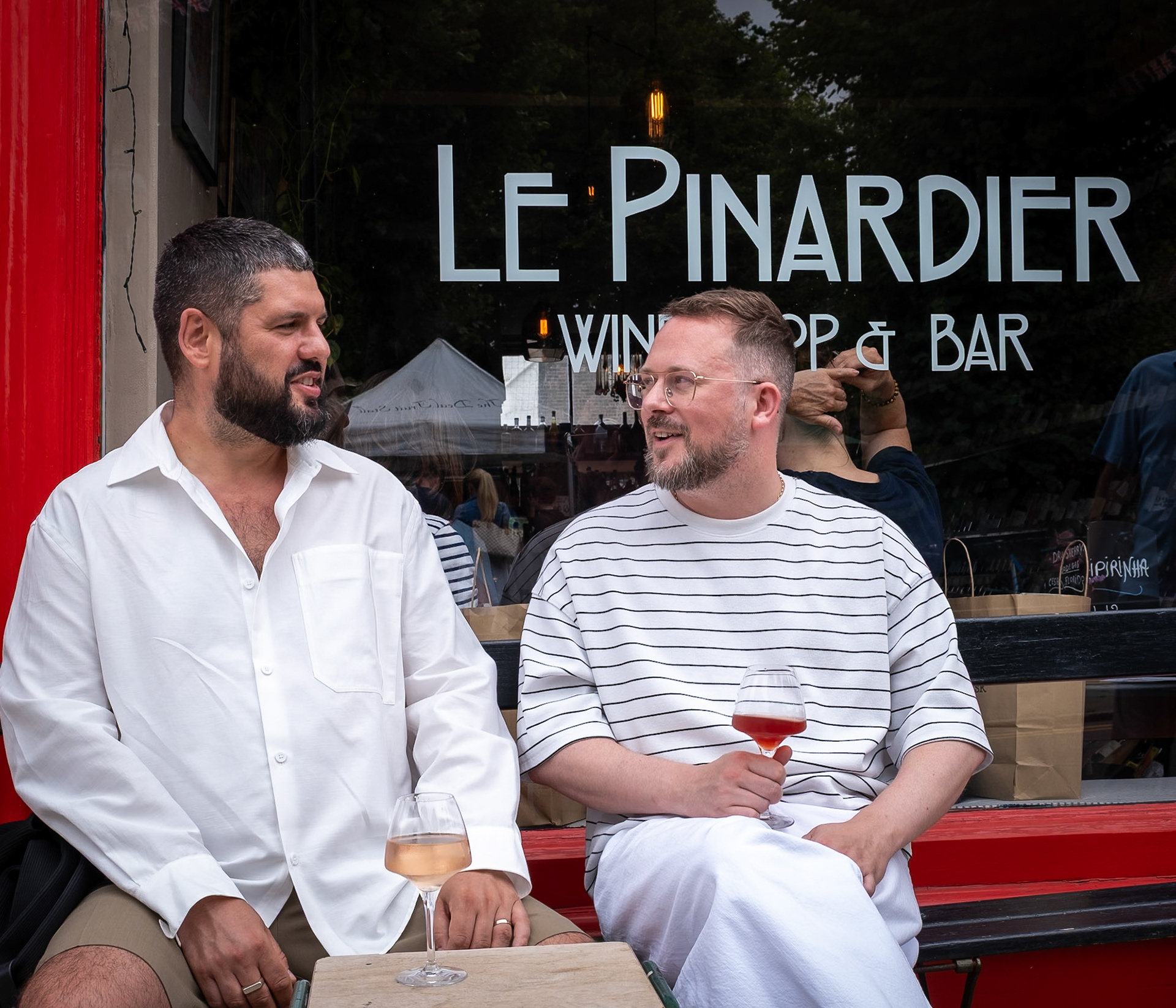 Daniel a reseller and retail agent in the shoe industry and Luke, a creative agent. Le Pinardier Wine Bar, High Street, 12th July, 2025. Daniel and Luke were visiting from Loughton, Epping Forest.