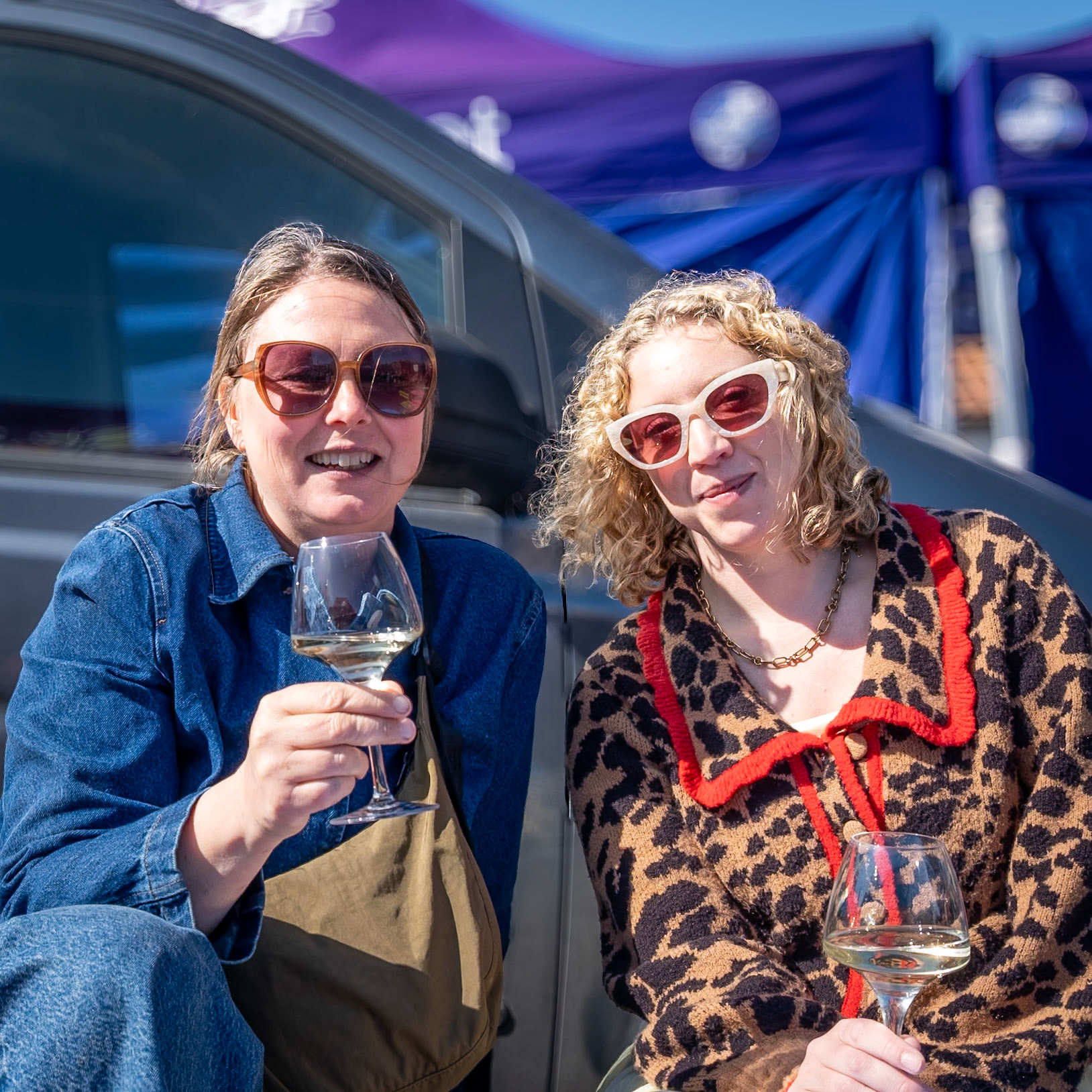 Malin, a lifestyle model and Harli, a ceramicist, enjoying a glass or two at Pascal's Wine Stall, Deal Market, 5th April, 2025.