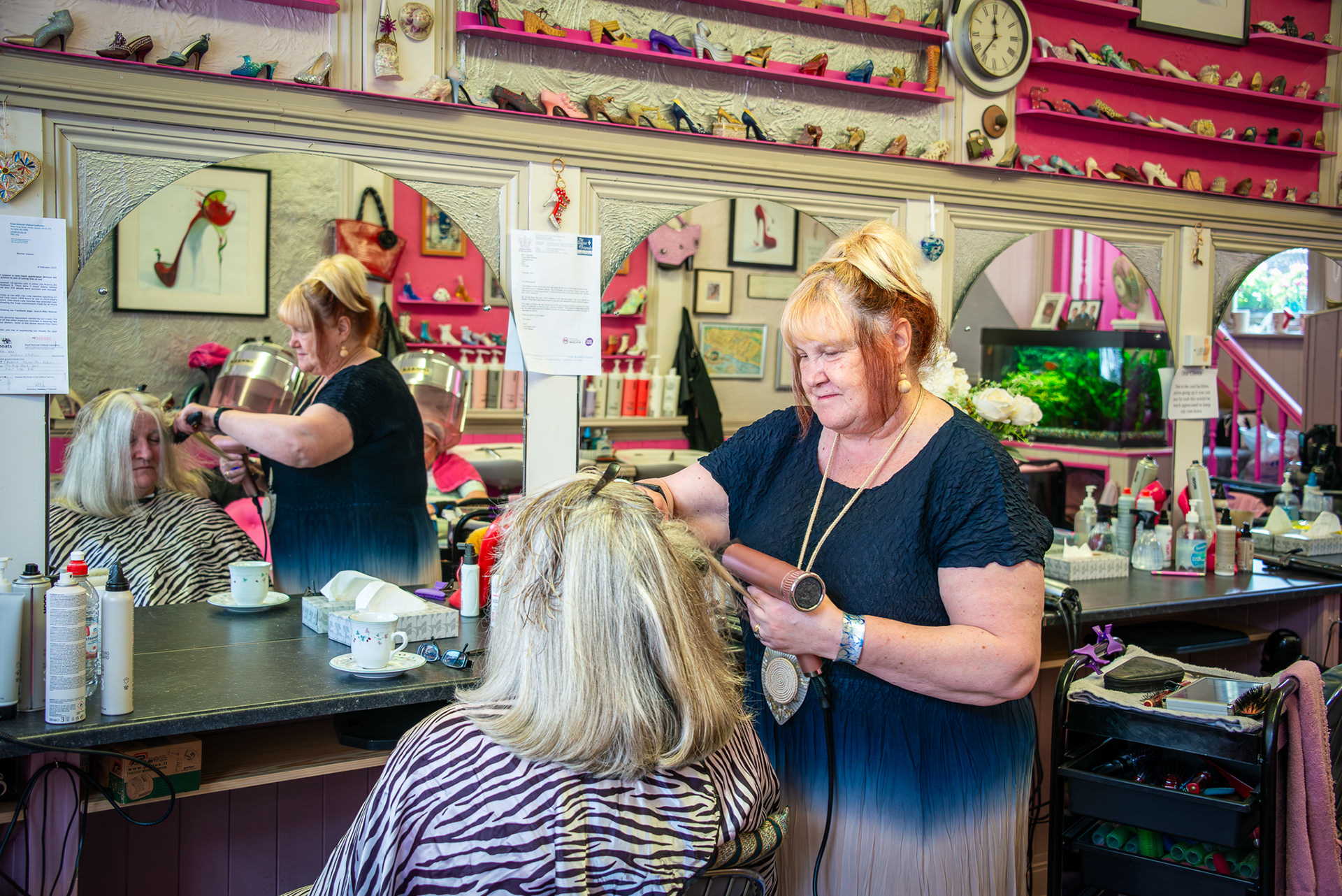 Teresa working on the hair of another Teresa at Teresa Hair Fashions, 126 High Street, Deal.  The hair salon is a vintage gem.