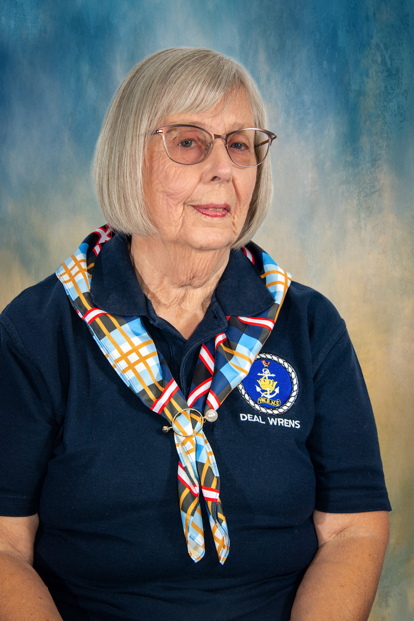 Cherry Hughes was a MaWren and worked at the Draft Pay and Records Office of the Royal Marines. She was stationed at RMB Eastney, Portsmouth. Cherry is the widow of Colour Sergeant Bugle Major Mick Hughes.