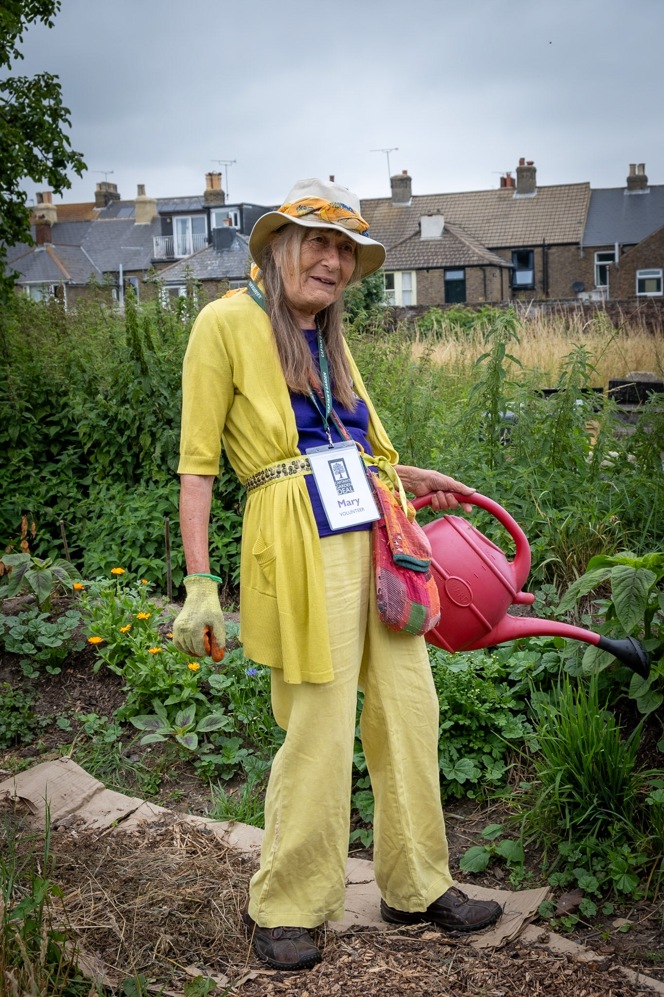 A portrait of Mary, a volunteer gardener at the Captains Garden
