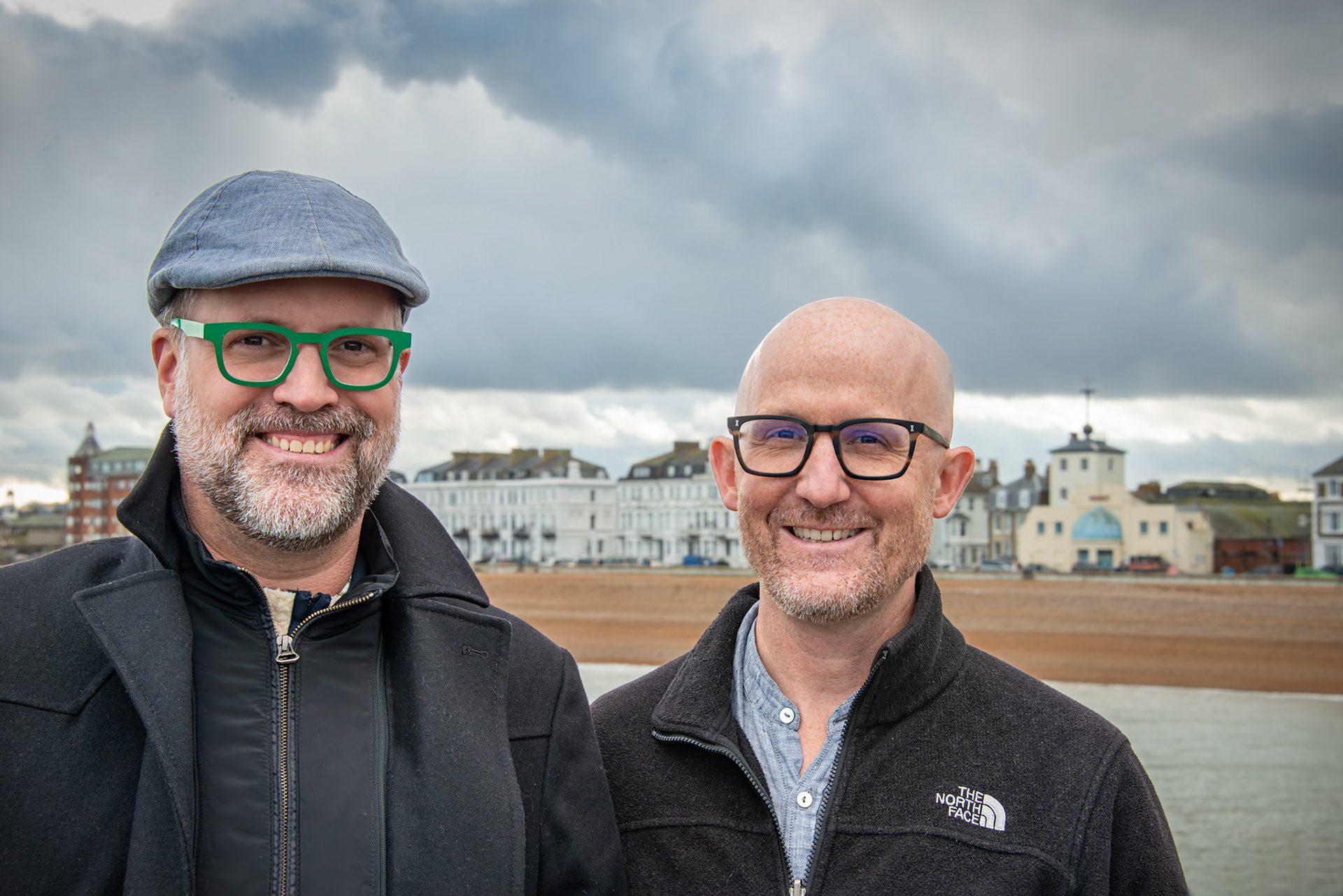 Phil and Tristan taking a stroll on Deal Pier, 18th February, 2024. Phil is a British Airways Pilot, Tristan is a Doctor. Part of our conversation was about the future of the former Regent Cinema on Beach Street, shown far right.