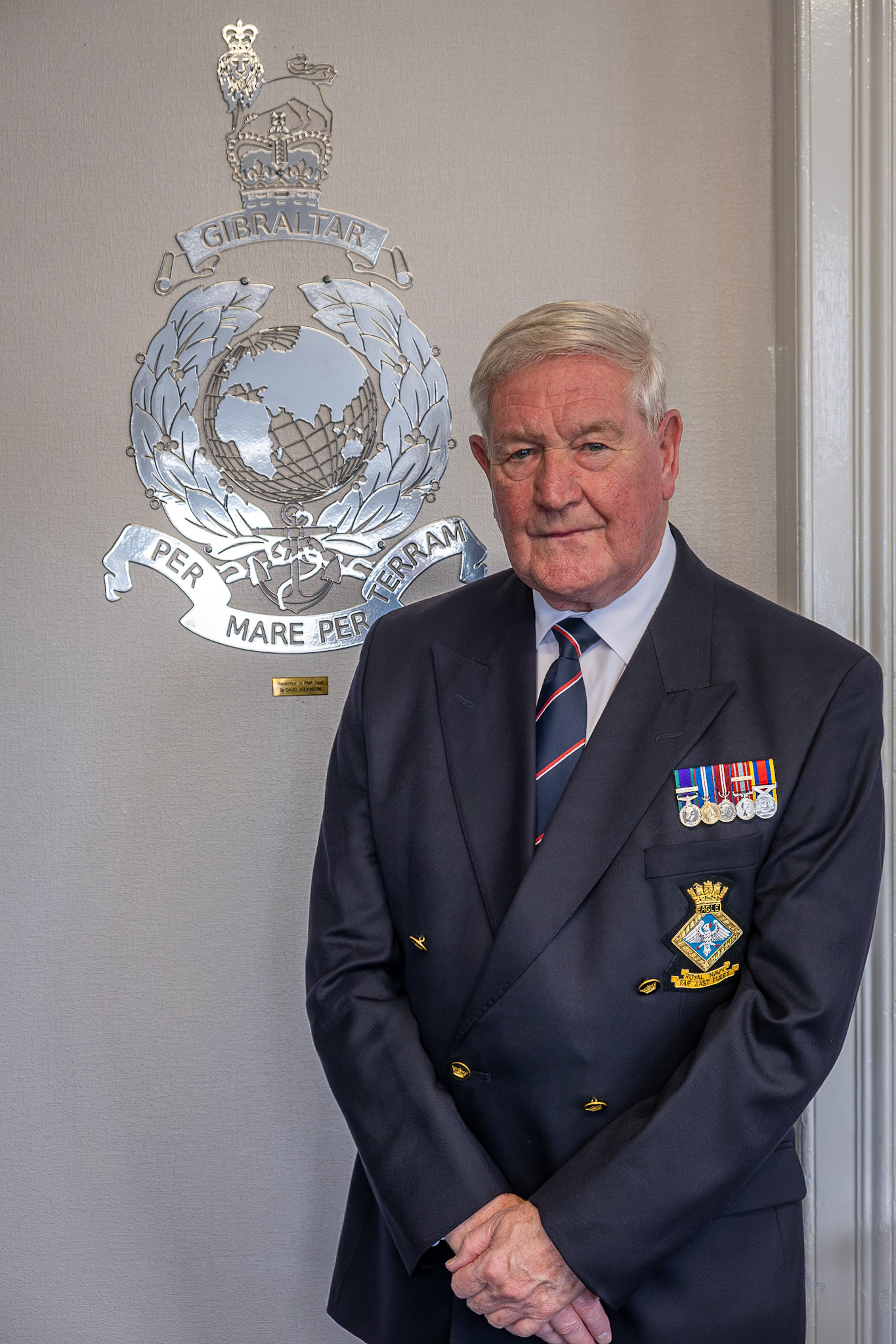 Peter Legg, formerly Royal Navy. Peter joined the Royal Navy in 1962 and became a specialist in electronic warfare, intelligence gathering and unjamming/jamming signals. He served on the Aircraft Carrier HMS Eagle. After retiring from the Navy, Peter was a senior Watch Officer and Coastguard Manager at Dover. He was also a member of the Dover Lifeboat Crew. Royal Marines Association Portrait Project, The Strand, Walmer, 12th July, 2025.