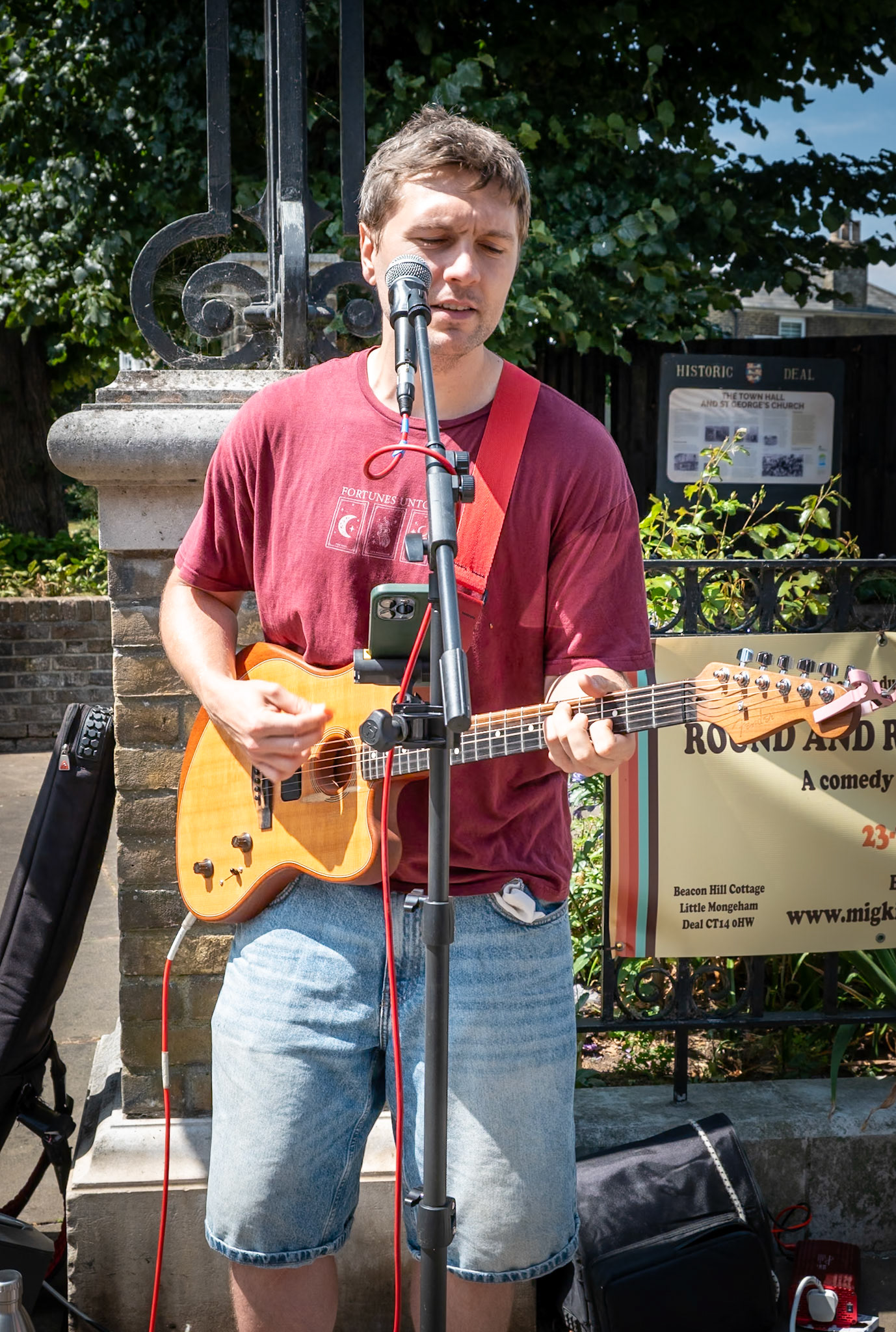 James Boyd, entertaining people in the High Street with his excellent guitar playing and singing. Outside St George's Church, Saturday 25th July, 2026.