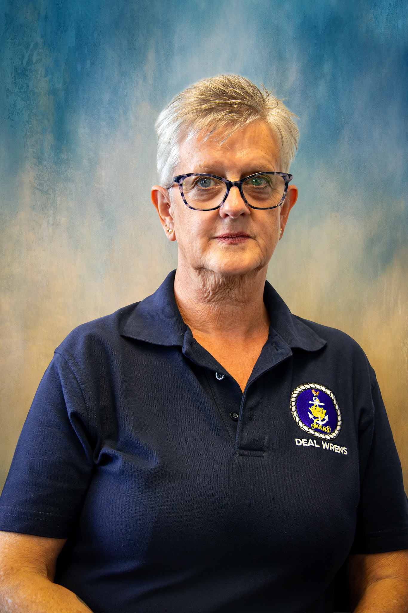 Caroline West joined the Wrens in July 1976. Having trained as a photographer she had postings to HMS Drake in Portsmouth, the Department of Royal Naval Public Relations in Whitehall and as Flag Officer Medway in Chatham. Caroline passed the interview board for a Commission and attended Britannia Royal Naval College in Dartmouth. In July 1080 she became Third Officer, WRNS. Following training as a Fleet Analyst, Caroline was posted to Whale Island in Portsmouth where she worked during the Falklands War. From 1982 to 1984 she worked for NATO in Naples.  Caroline's final years were spent in Portsmouth Dockyard at CWTA, Captain Weapons Trials and Assessment. She completed her Commission and left the WRNS in July 1988.