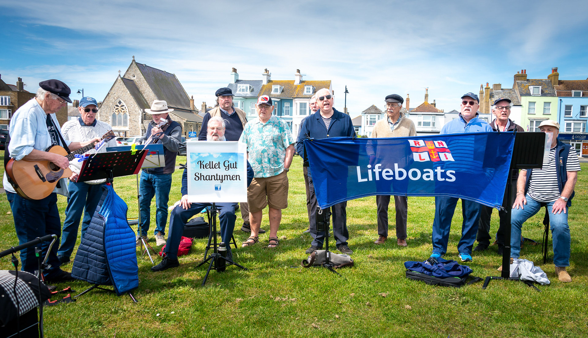 The Kellet Gut Shantymen performing and fundraising on Walmer Green for the RNLI, 4th May, 2024.