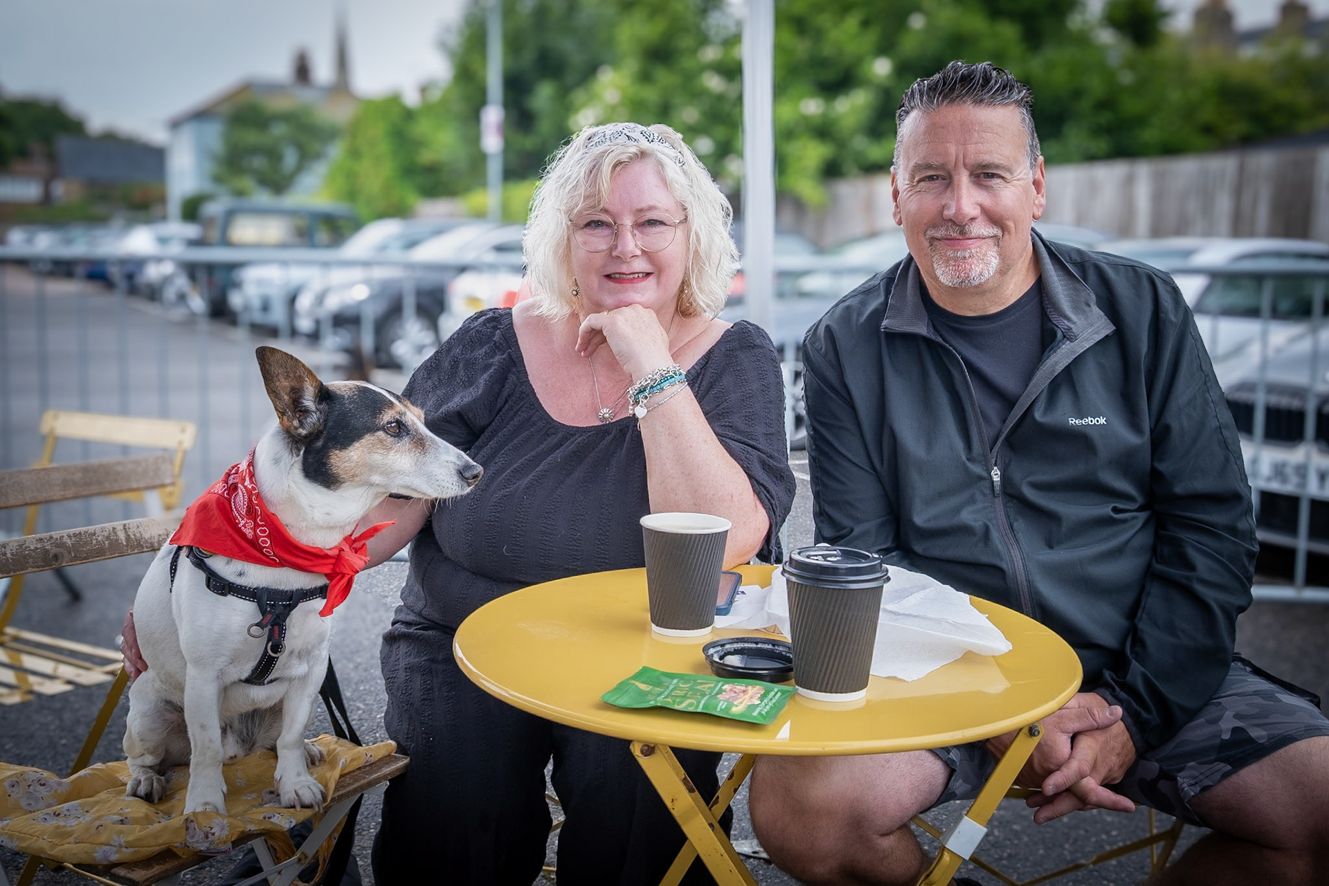 Lisa, Glyn and their dog, Harvey. Lisa is interested in artistic photography and Glyn is an IT Engineer. Hog on the Run Coffee Bar, Deal Market, 19th July, 2025.
