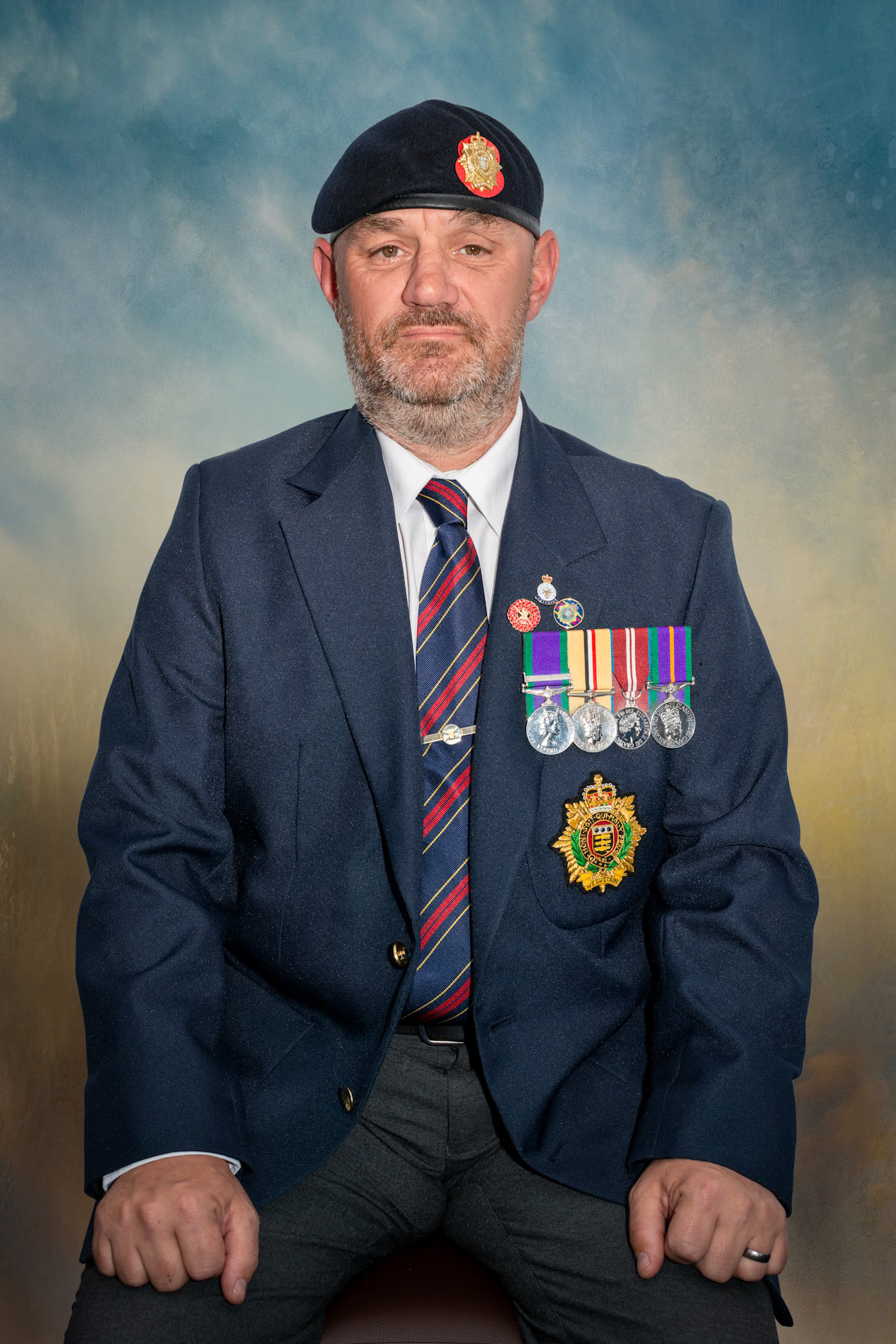Mark Richardson, formerly of the Army Royal Logistical Corps 1997-2014, serving in Northern Ireland and Iraq. He now works as a lorry driver. The Strand, Walmer, 24th May, 2025.