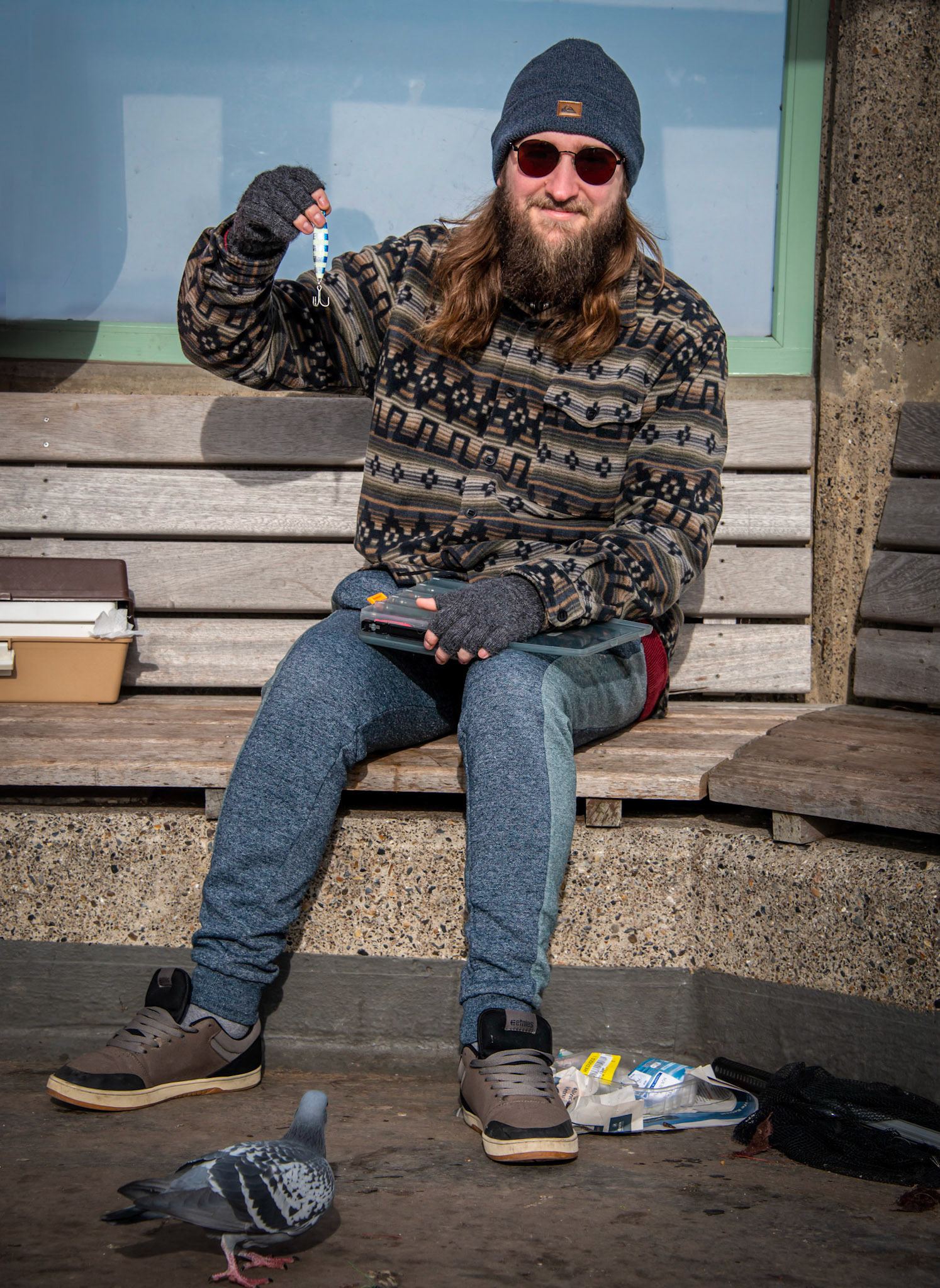 Ben, a mechanic of Folkstone fishing on the Pier.