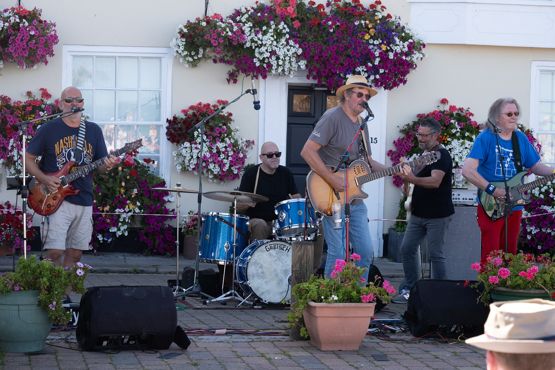 Rock band, Strydes, playing outside the Kings Head and Port Arms, Beach Street, Deal, this afternoon, 20th August, 2023.