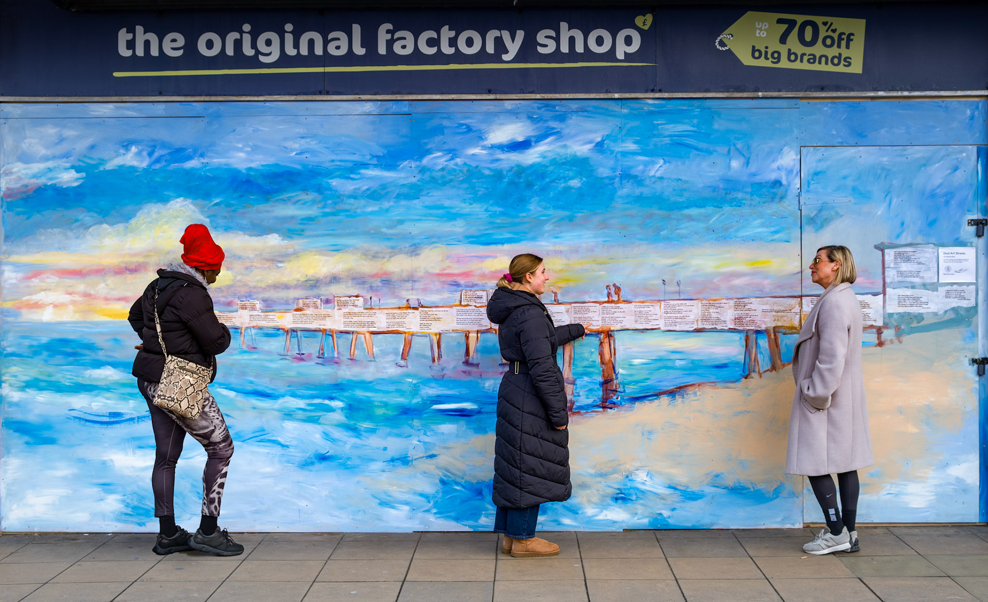 Susan, Maisie and Terry reading the poetry on the mural at the Old Factory Shop. The mural was painted by Penny Bearman, Stephanie Fuller and Susan Beresford. The poems are from a book produced by the Deal Poetry Group. All proceeds go to Red Duck Charity supporting children in palliative care. 8th February.