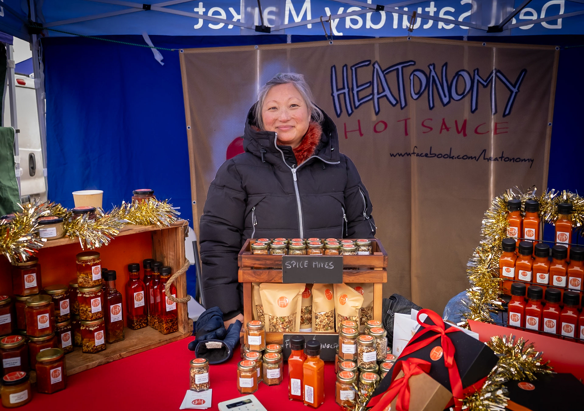 Petra, founder-owner of Heatonomy, Sushi Chef and Blogger running her regular stall at Deal Market, 2nd December, 2023. Petra's chilli oils, spice mixes and other concoctions are both innovative and delicious. www.petra08.wordpress.com