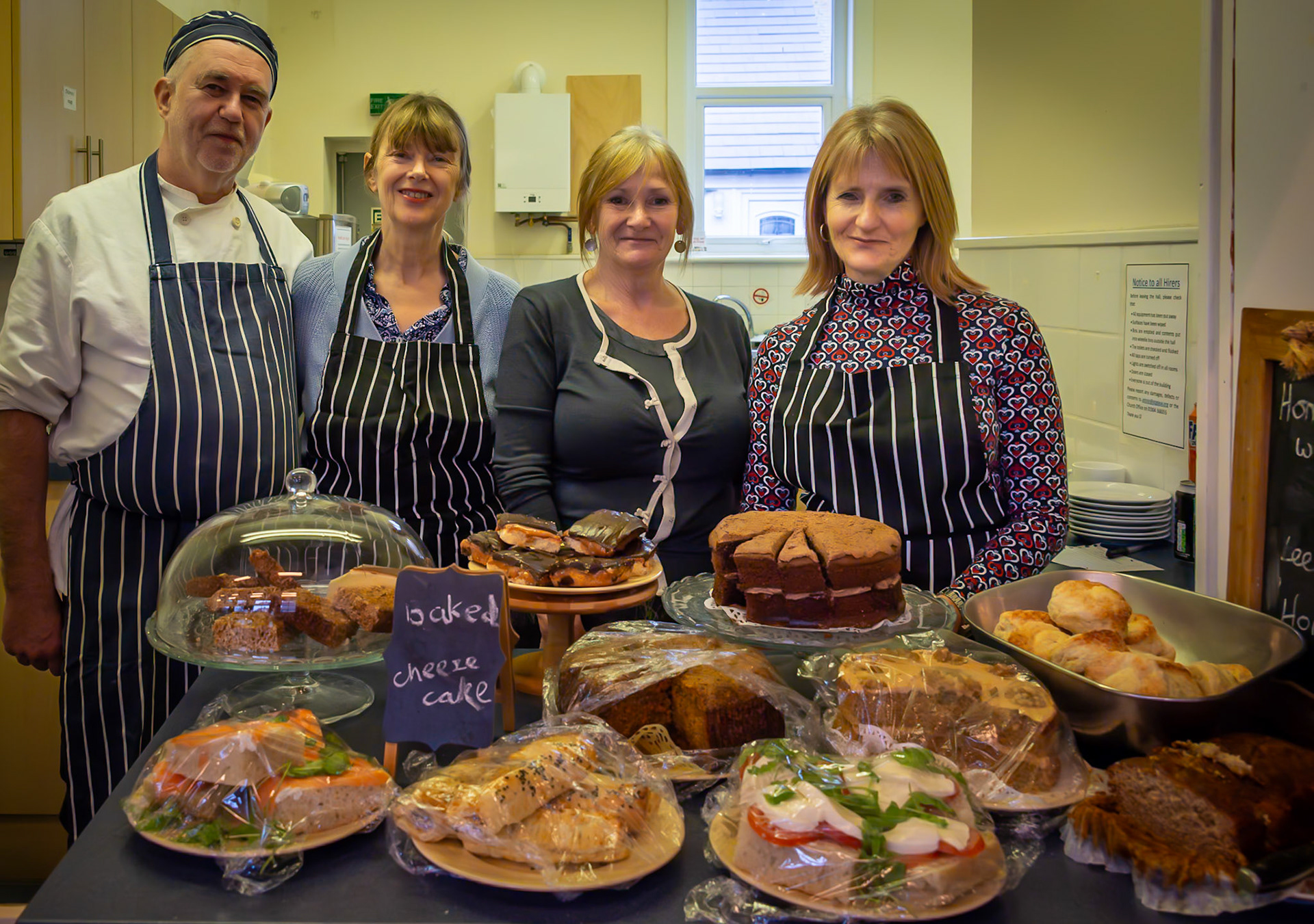 Matt (Chef), Charlie, Phillipa and Elinor selling fantastic home made food and drinks at the South East Artists' Postcard Art Exhibition, St George's Hall, 9th November, 2024.