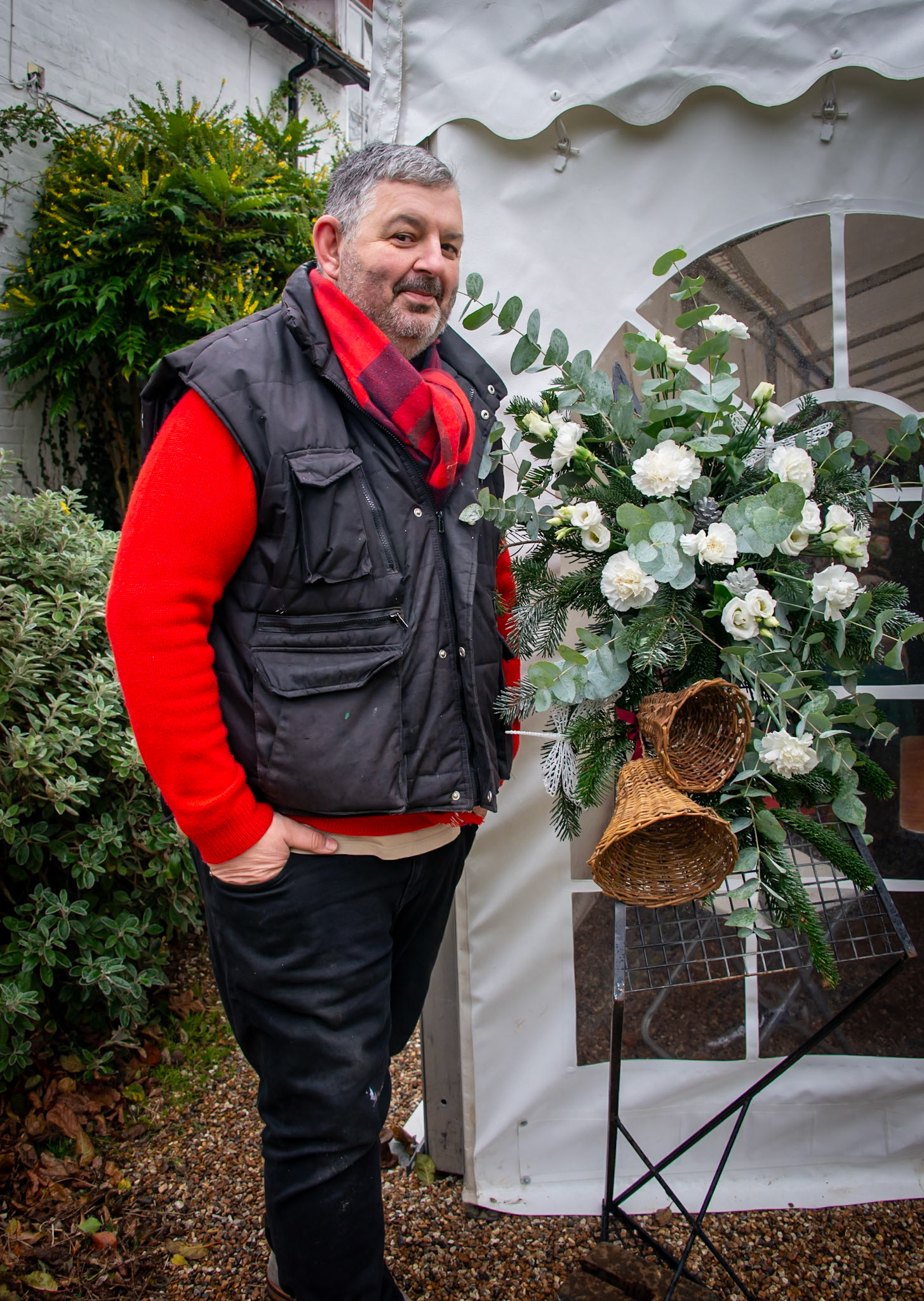 Mig Kimpton the host of the Frost Fair at Beacon Hill Cottage, Little Mongeham, Deal, 7th December, 2024. Mig spent 30 years in theatre, running west end theatres, managing tours for many stars, particularly Sir Ian McKellen and working for the Royal Shakespeare Company. Mig also has a life long passion and career with flowers and has won numerous awards, including 12 prestigious medals at the RHS Chelsea Flower Show. He is an adivisor at several major flower shows and runs workshops near Deal in Kent.