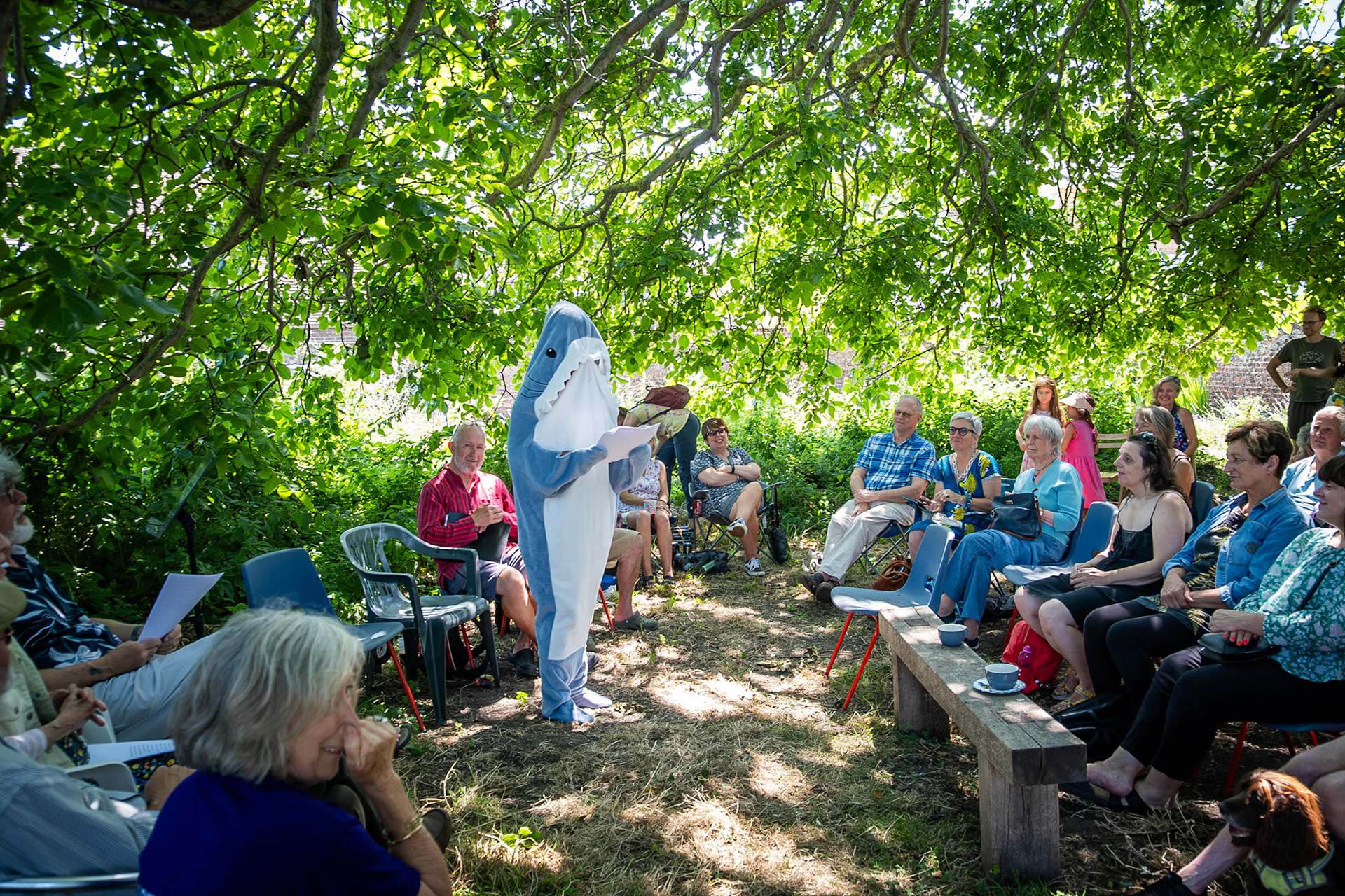 Caroline in her dolphin suit/ Poetry readings at the Captains Garden Open Day 