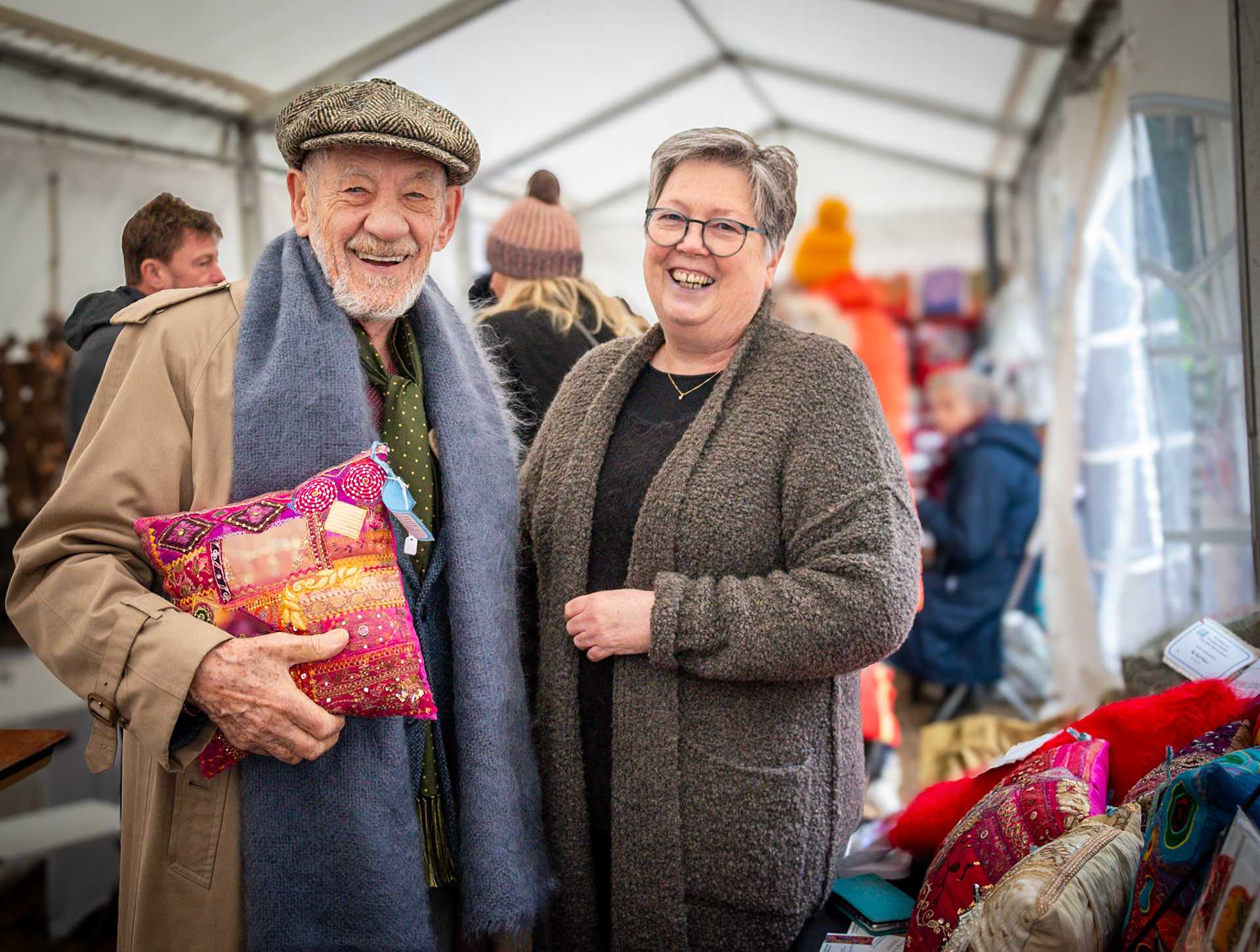 Sir Ian McKellen with Susan Begg a maker of unique textile items. The Frost Fair at Beacon Hill Cottage, Little Mongeham, Deal, 7th December, 2024.