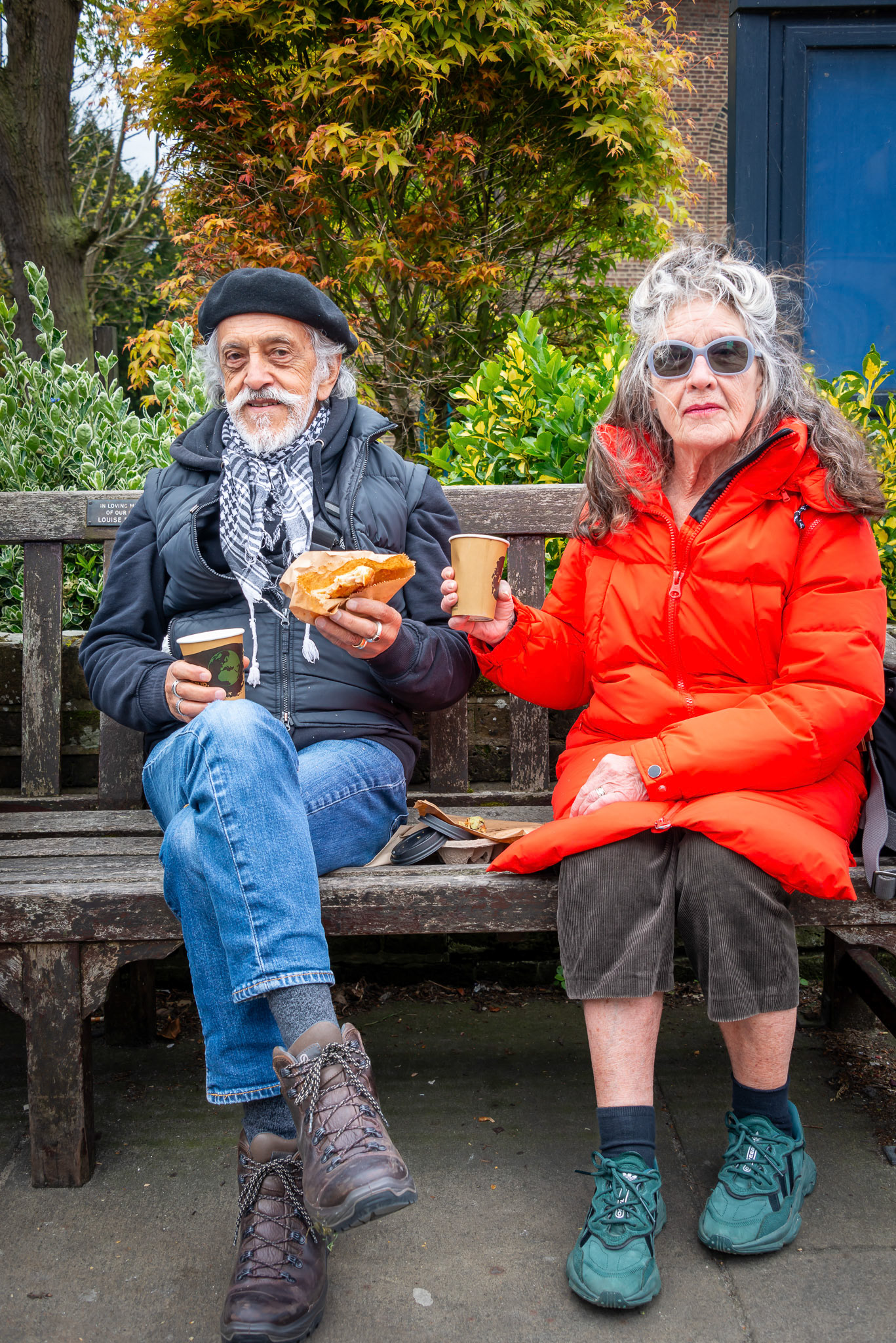 Javier Molina, a photographer and Lorraine, a retired teacher having a little picnic outside St George's Church., 20th April, 2024. Javier makes imaginative composite images. I find his work inspirational. www.molinabarrios.com