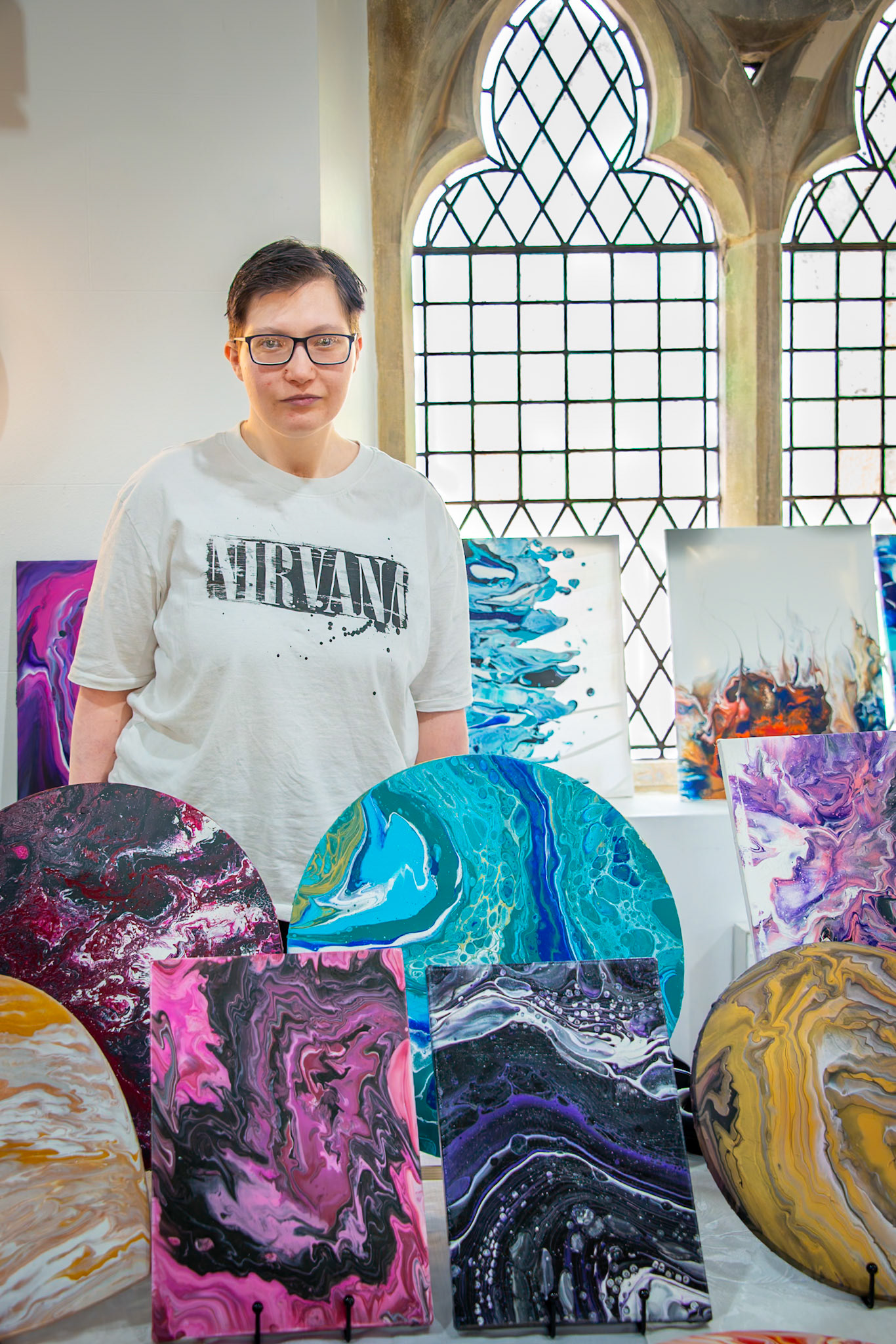 Zena of Pouring Paintings. Craft Fair for the Leaps and Bounds Community Project, The Landmark Centre, 12th April, 2025. The project promotes independence and provides skills for adults with learning disabilities.