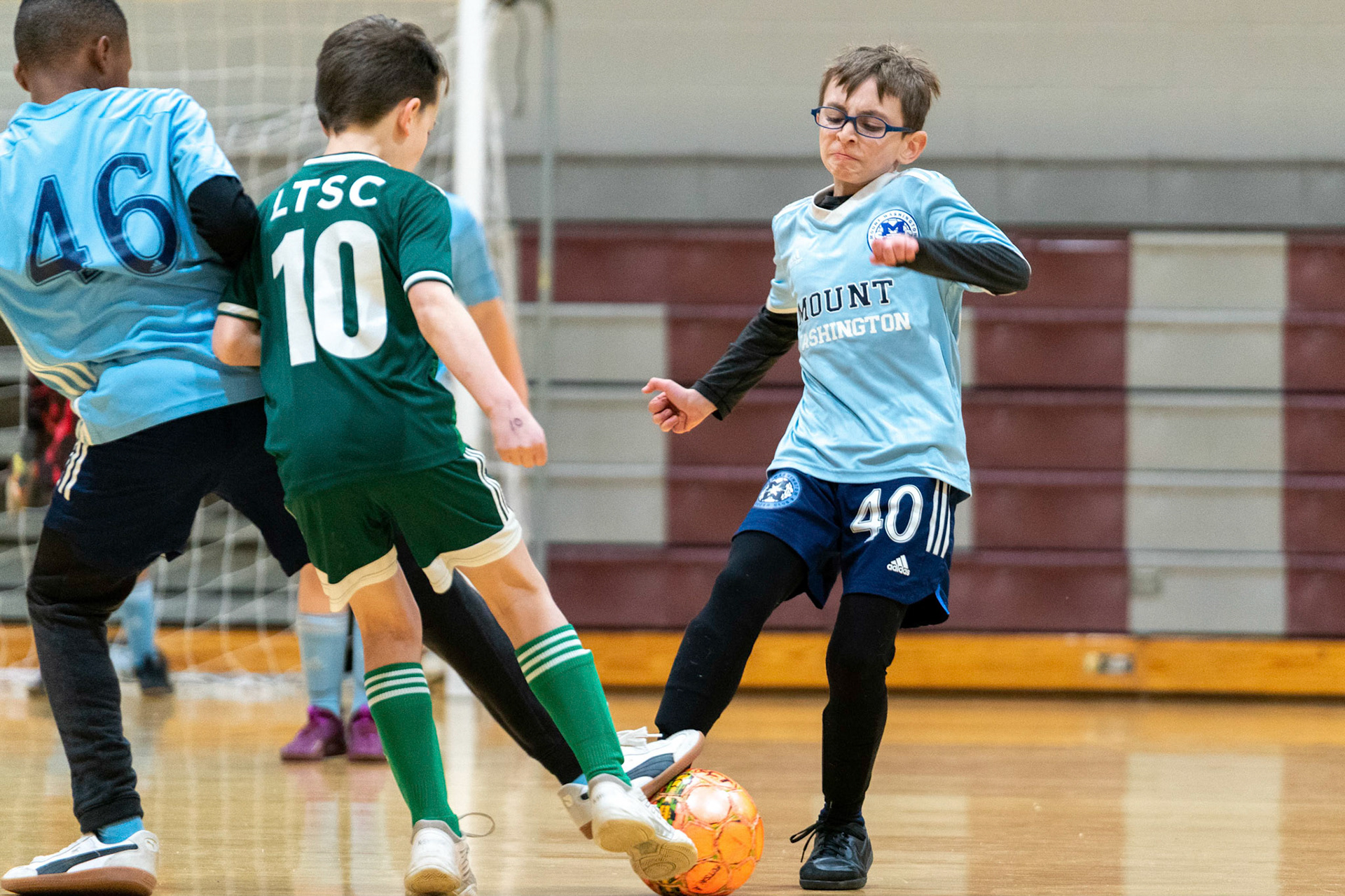 Treme, Jonah, and a defendervie for a loose ball as MWFC defeats LTSC 8-2 on Saturday, February 4, 2023.