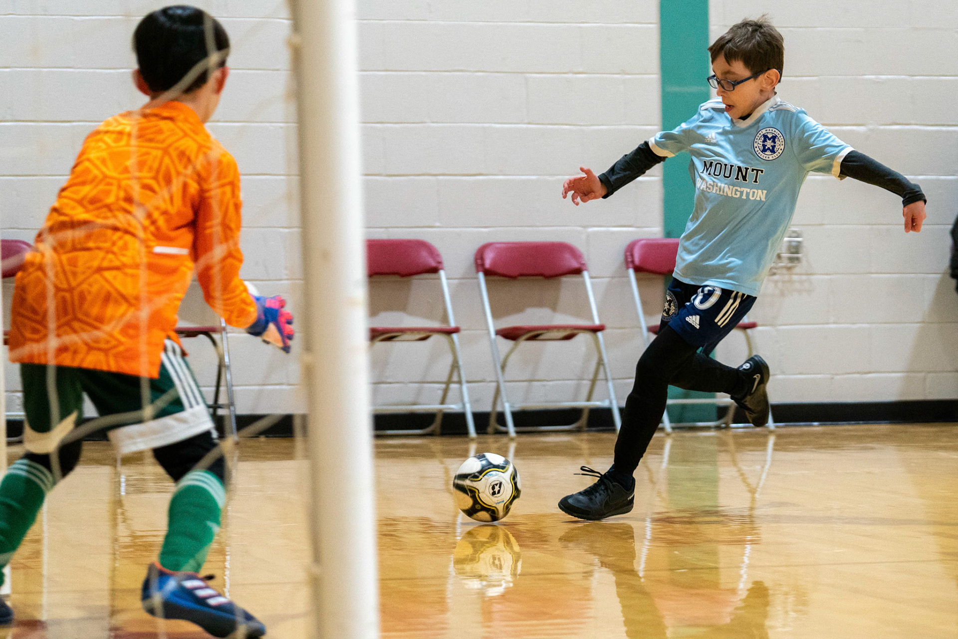 Jonah takes on the goalies as MWFC defeats LTSC 8-2 on Saturday, February 4, 2023.