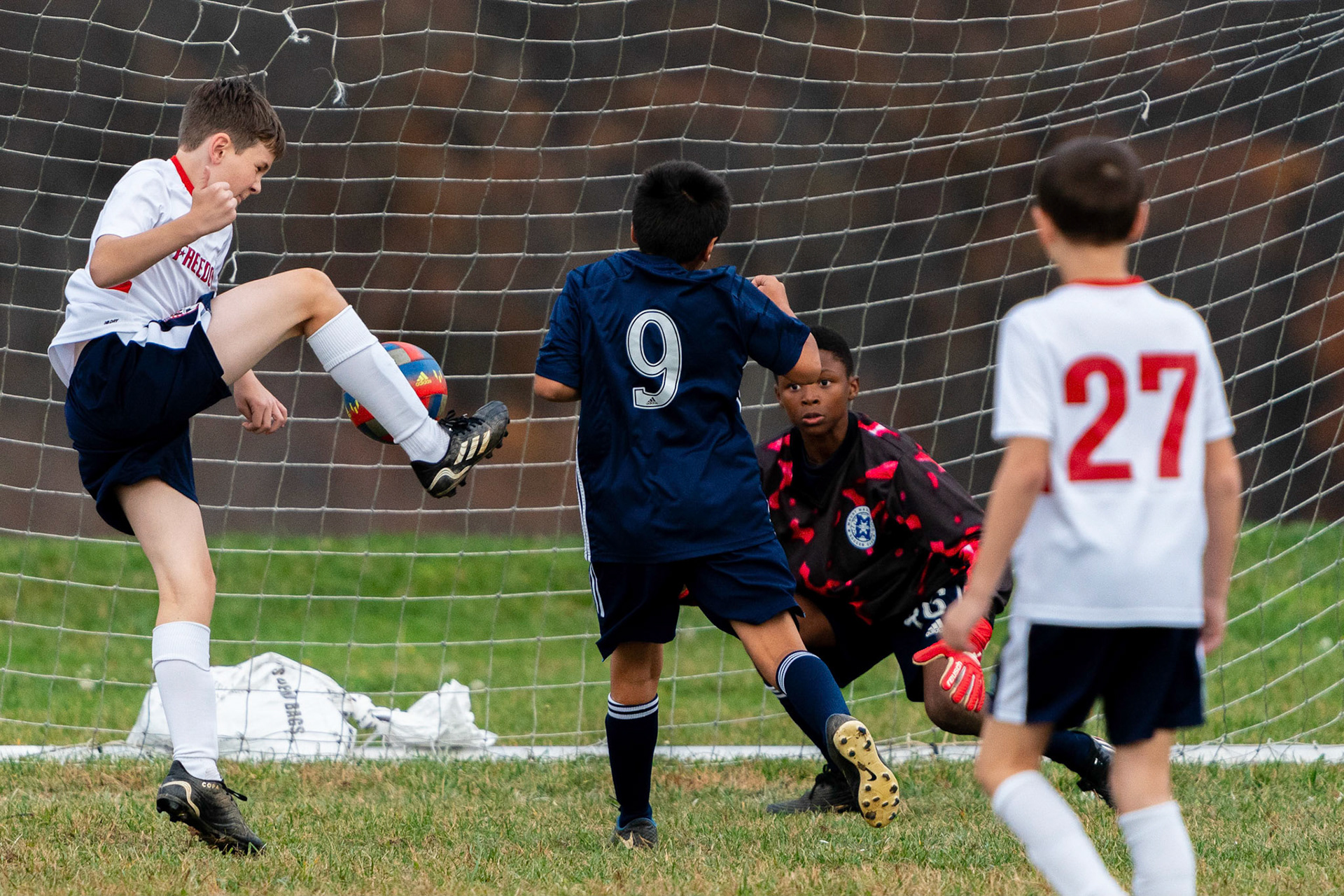 Treme watches the ball all the way and makes a save in the first half as Mt. Washington defeats Freedom SC 2-1 in their final game of fall 2022.