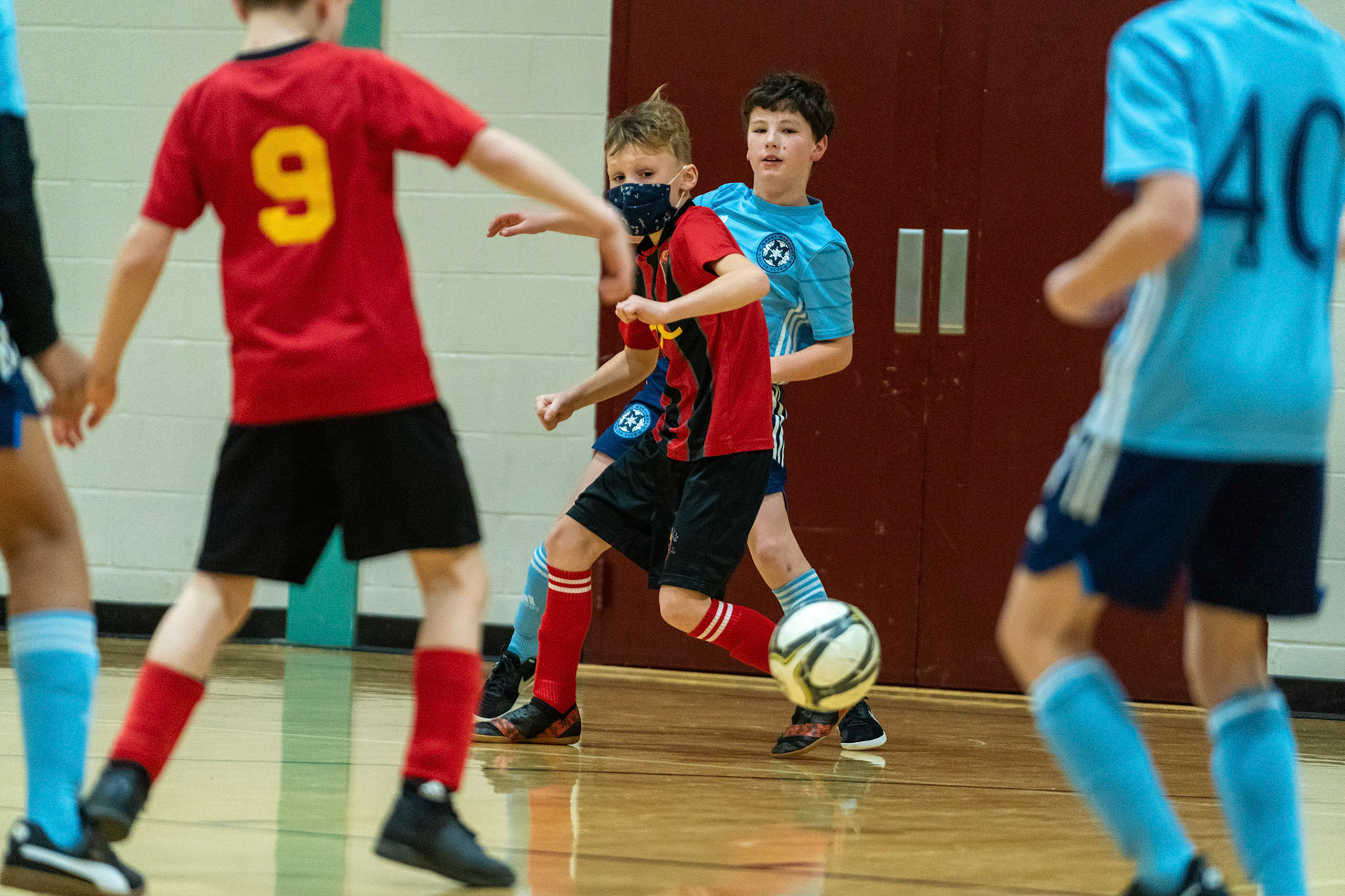 Cameron sends a ball into the offense in the first half of the Mt. Washington Soccer 22/23 11-3 victory over  Charles Village.