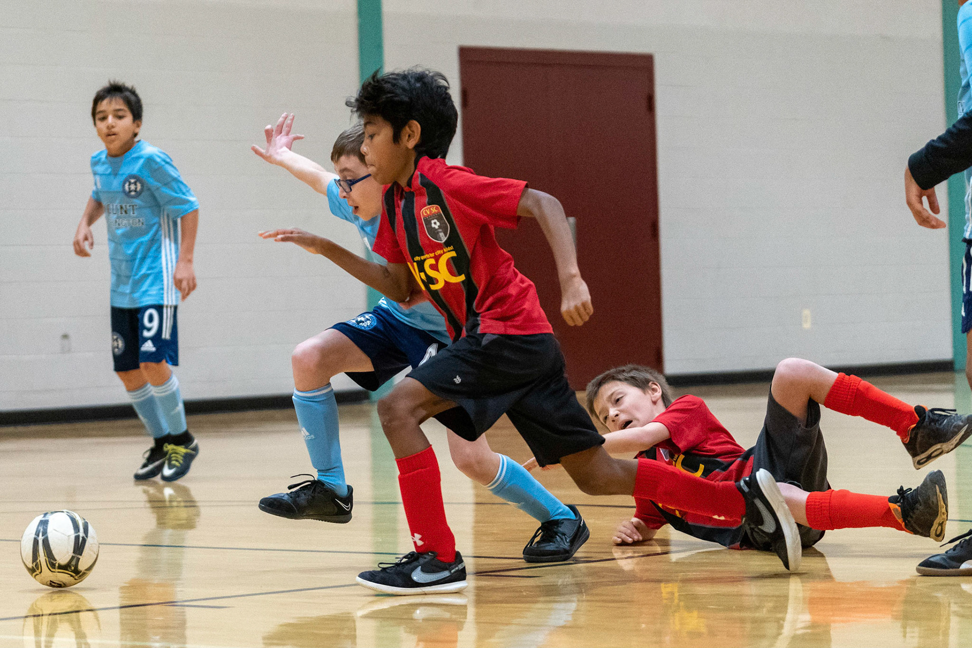 Jonah heads to goal as he is closely defended late in the second half of the Mt. Washington Soccer 22/23 11-3 victory over  Charles Village.
