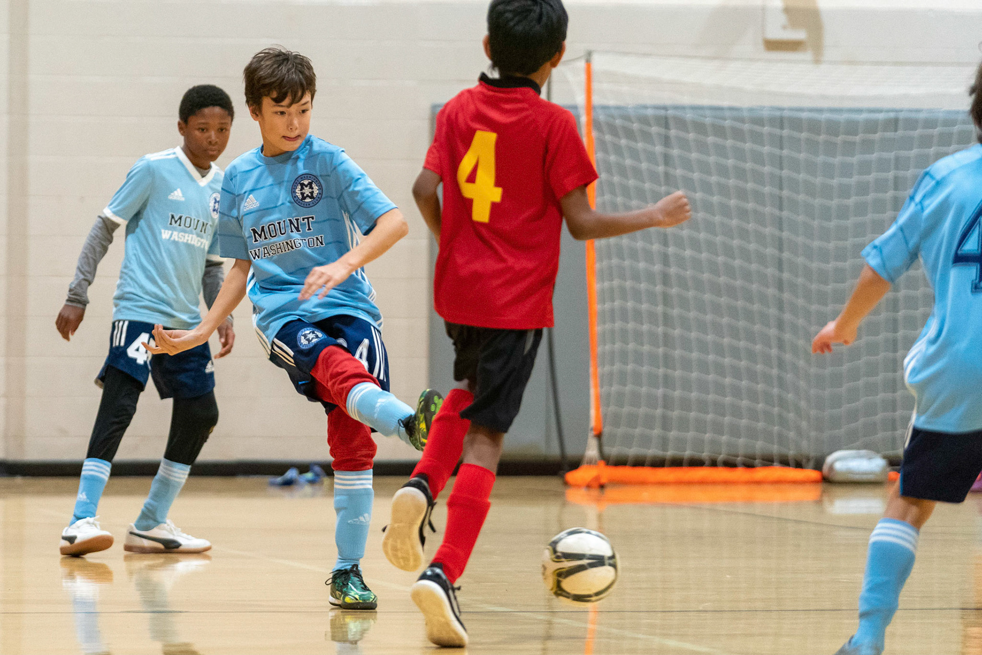 Luke sends the ball forward in the first half of the Mt. Washington Soccer 22/23 11-3 victory over  Charles Village.