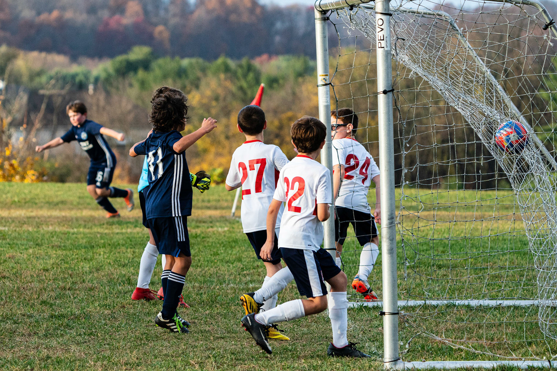 Graham continued his excellent corner kick service as his delivery is knocked into the goal by Freedom in the second half as Mt. Washington defeats Freedom SC 2-1 in their final game of fall 2022.