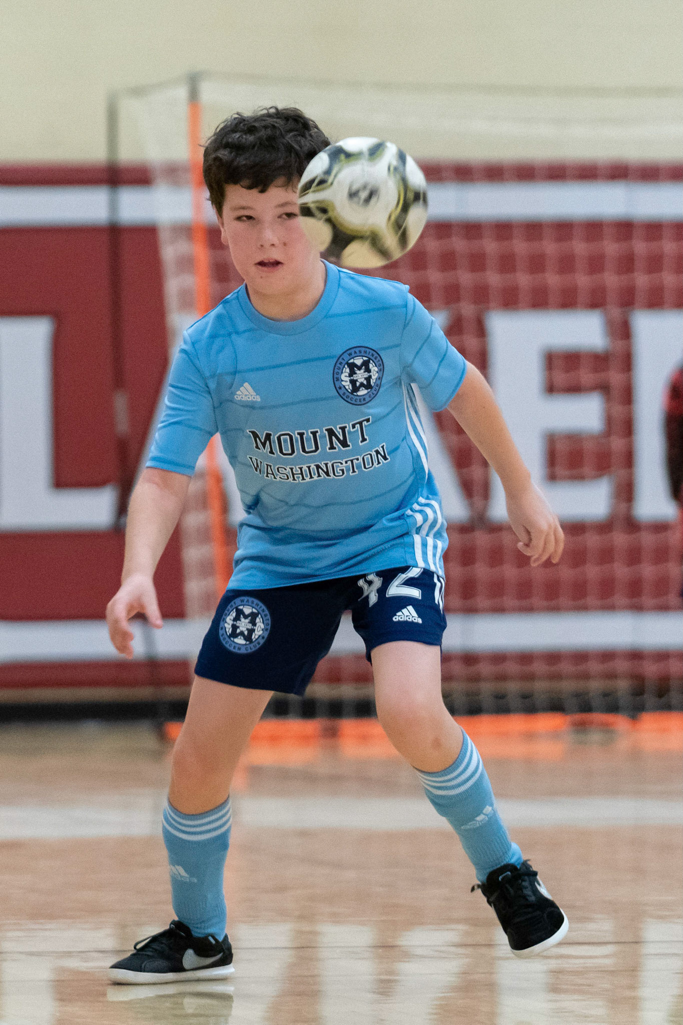 Cameron keeps his eyes on the ball in the second half of the Mt. Washington Soccer 22/23 12-5 victory over  Towson United. Each player scored.