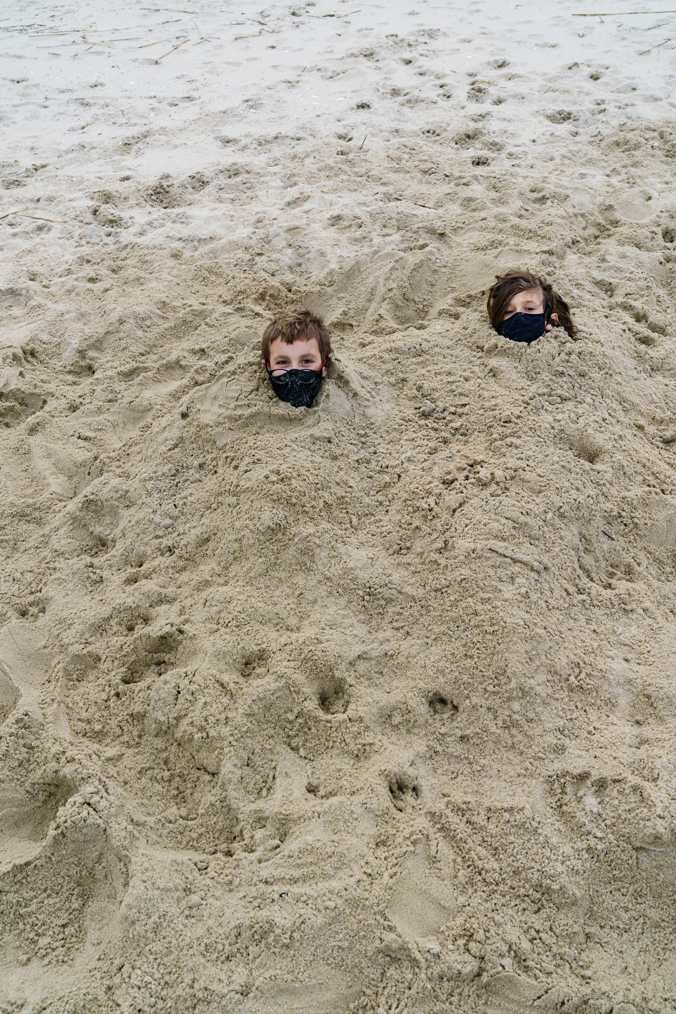 New Year’s trip to the beach. Hike at Gordon Pond in Cape Henlopen. Playing at the beach. Buried little ones.