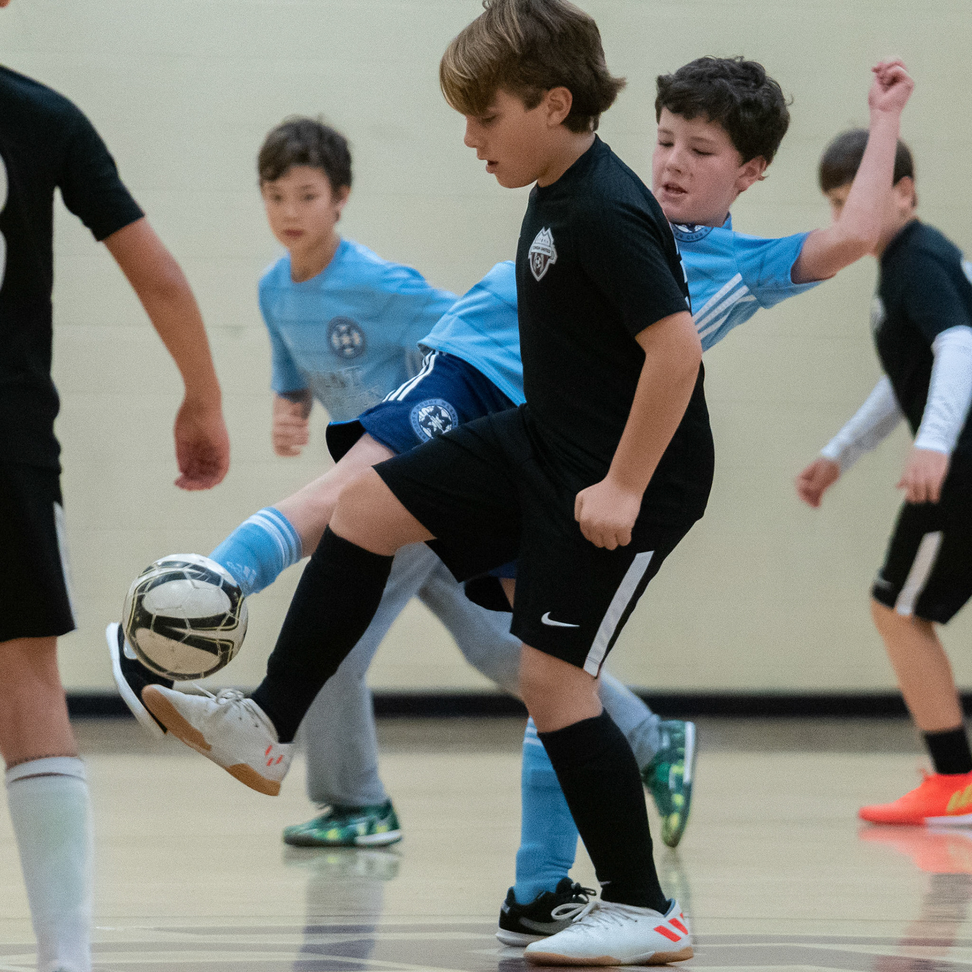 Cameron’s shot wraps around the defender in the second half of the Mt. Washington Soccer 22/23 12-5 victory over  Towson United. Each player scored.