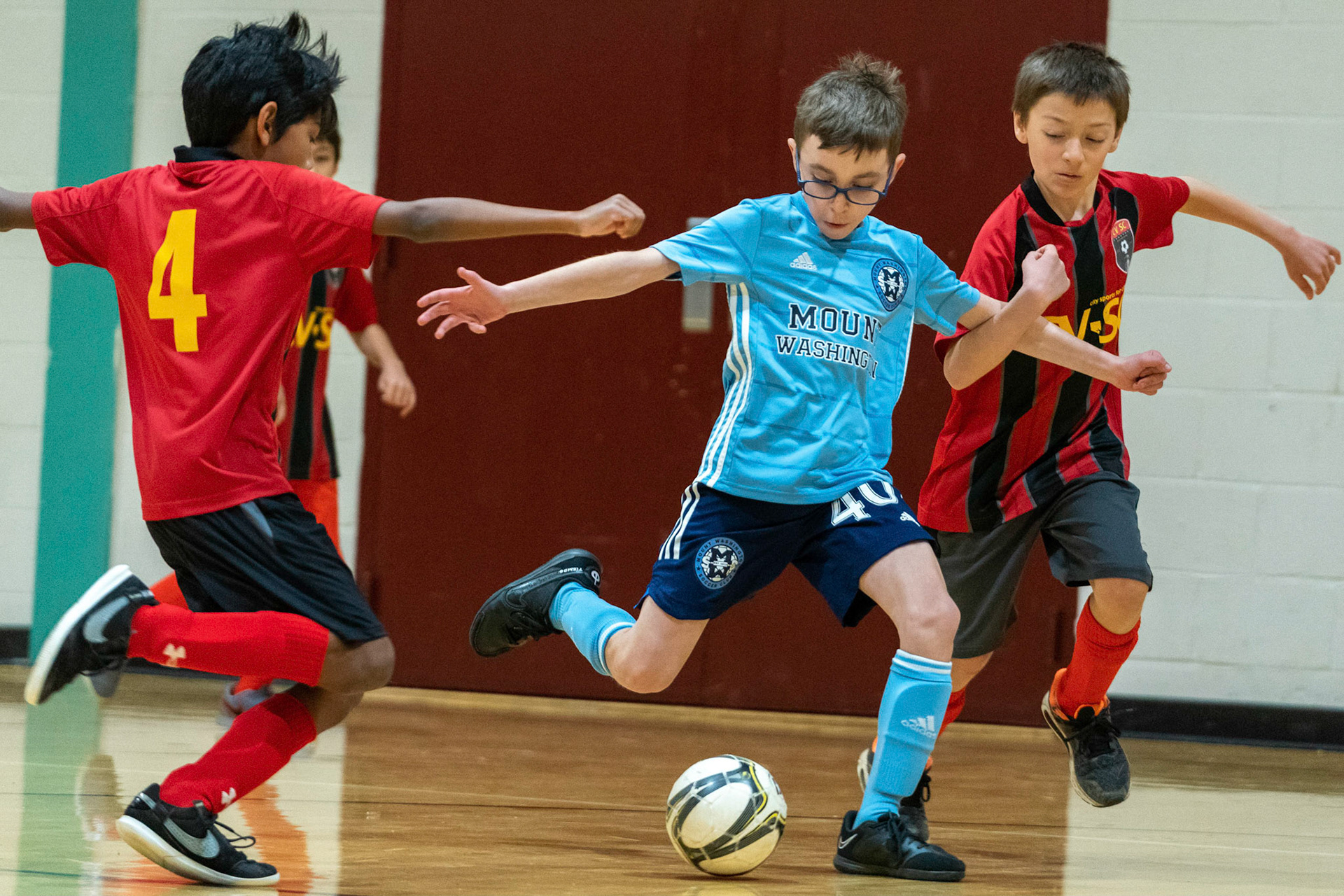 Jonah looses a shot as defenders close in on him in the first half of the Mt. Washington Soccer 22/23 11-3 victory over  Charles Village.