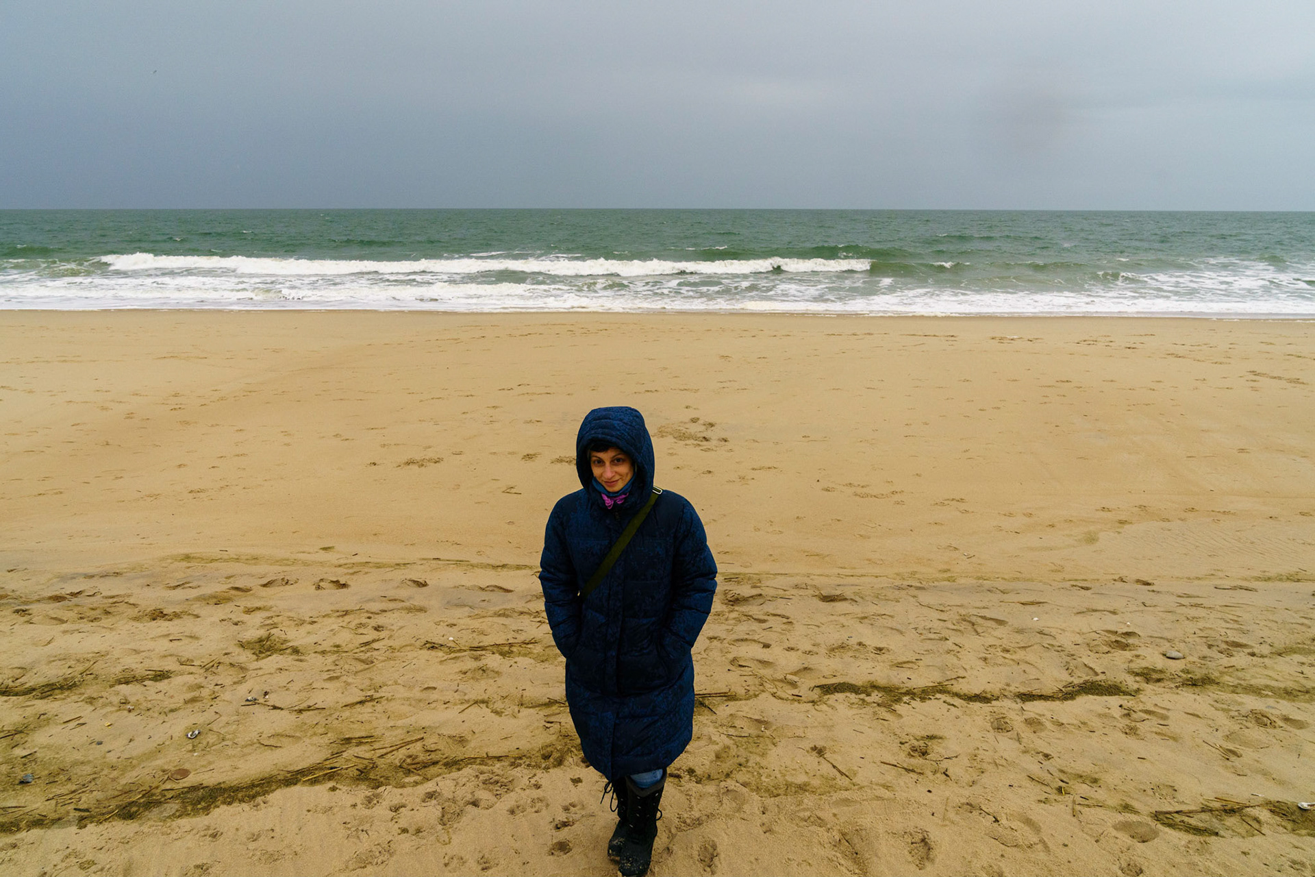 New Year’s trip to the beach. Playing at the beach. Buried little ones.